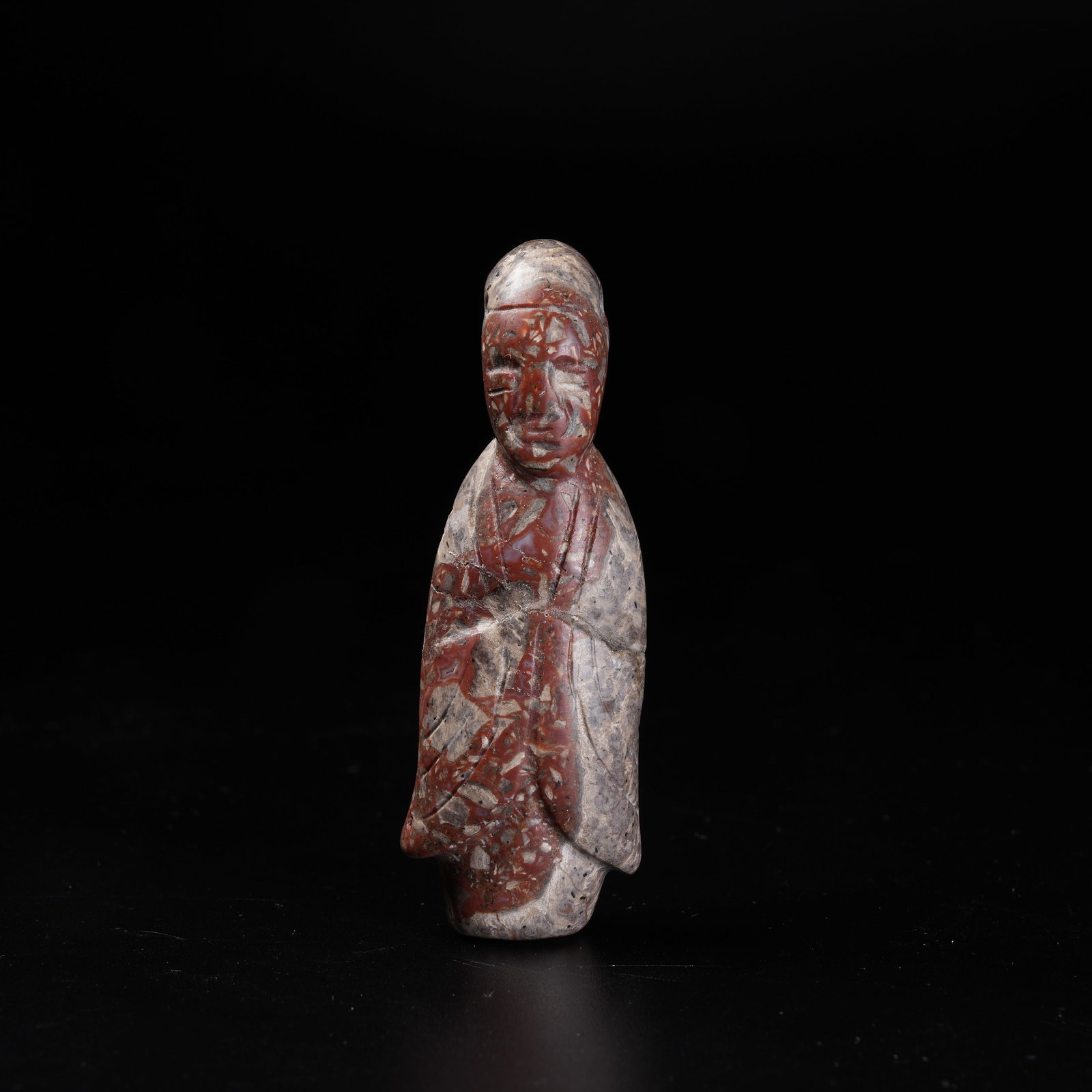 A WARRING STATES RED AGATE FIGURINE PENDANT (1 of 9)