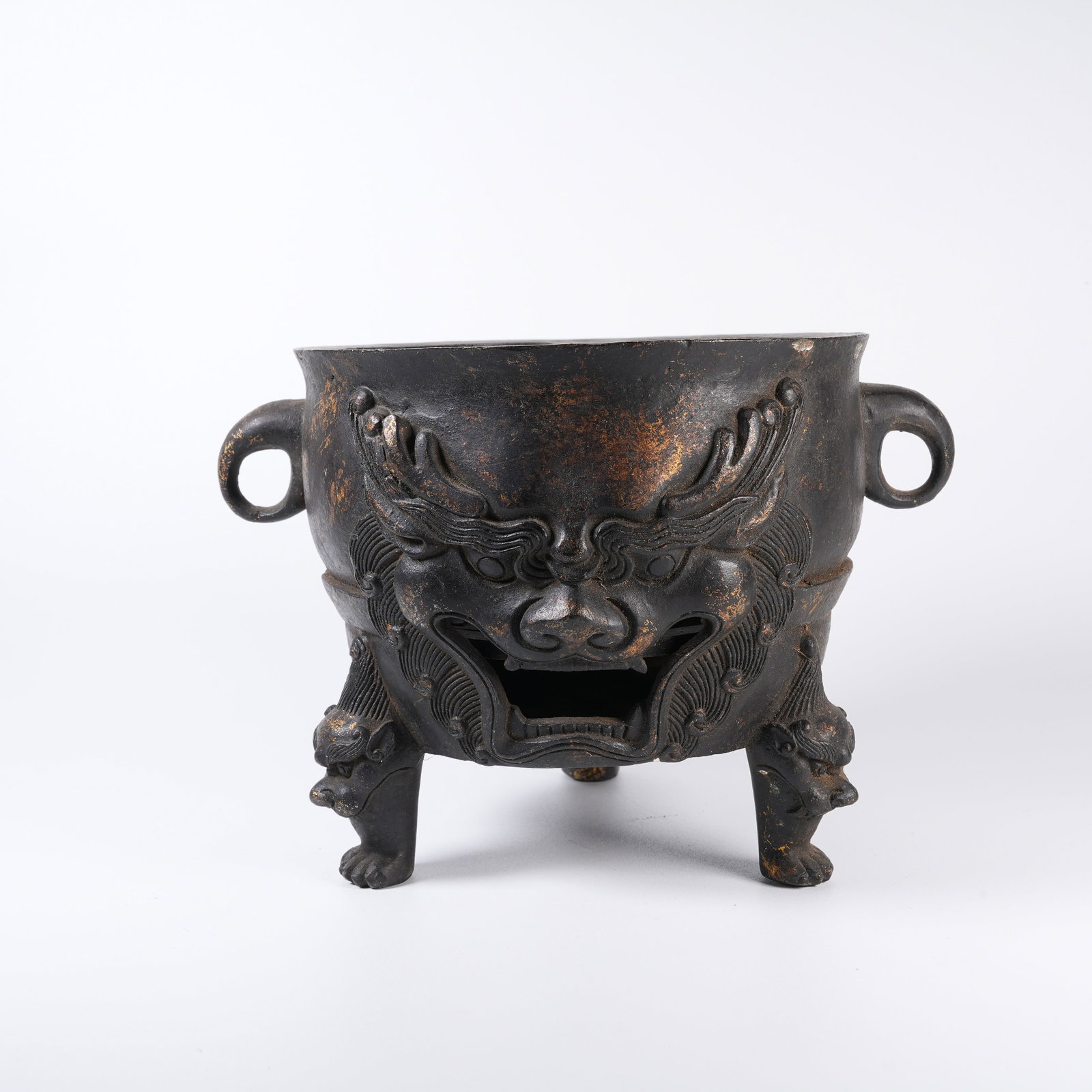 A BRONZE TWO-EARED CENSER WITH BEAST-MASK PATTERN AND BEAST-SHAPED FEET: Bronze Two-eared Censer with Beast-mask Pattern and Beast-shaped Feet