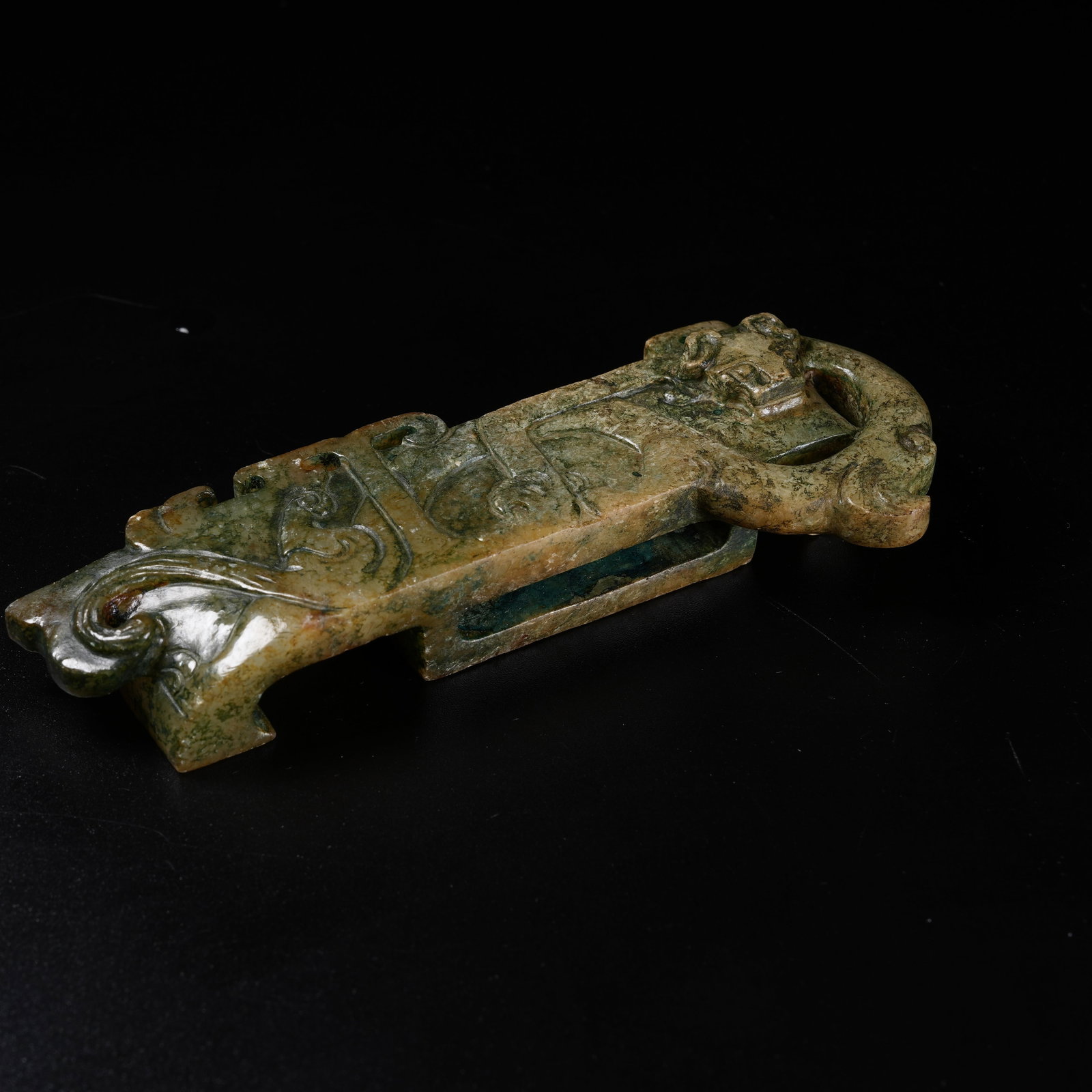 A ARCHAIC JADE SWORD GUARD CARVED WITH CHILONG DRAGON PATTERN: Archaic Jade Sword Guard Carved with Chilong Dragon Pattern