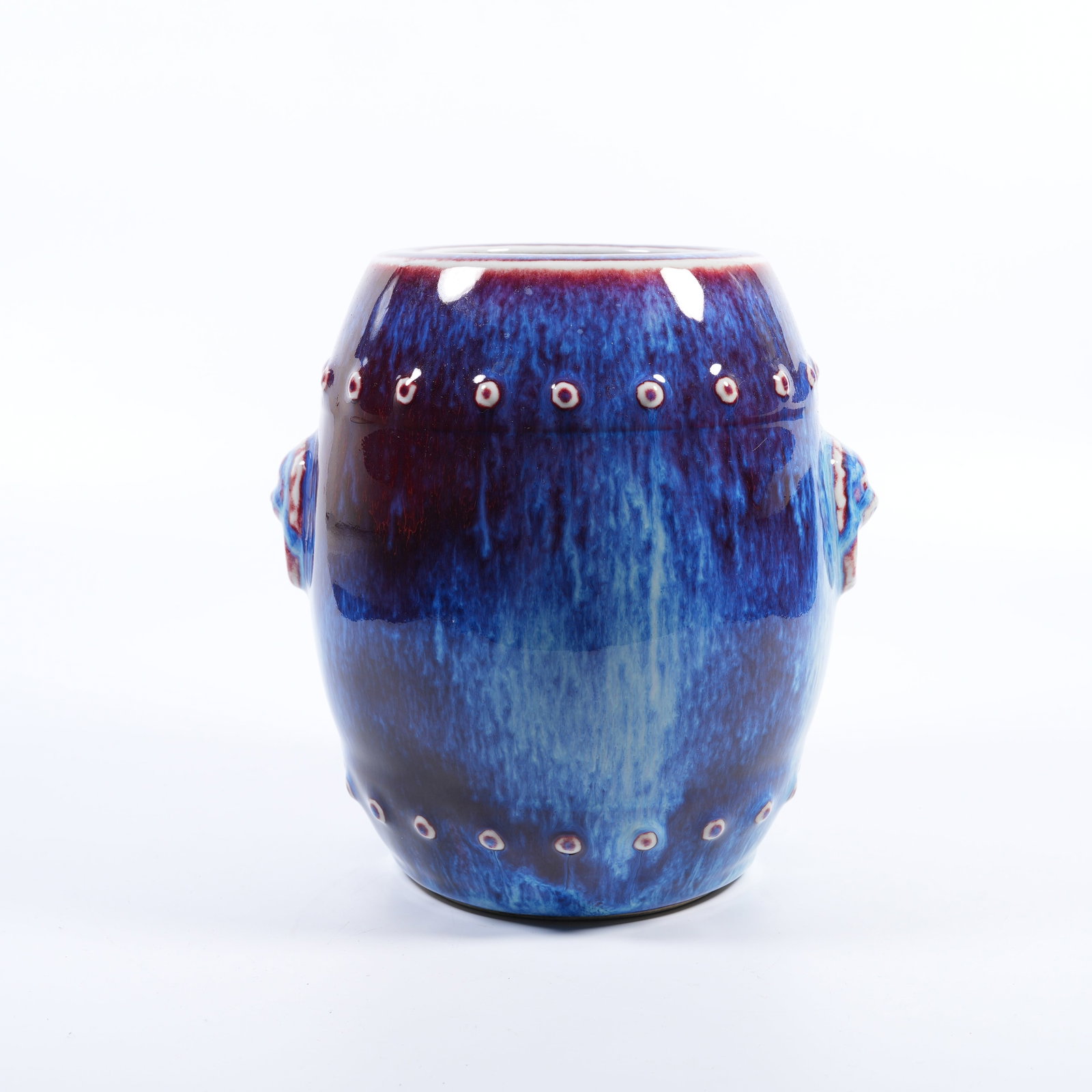 A FLAMBE GLAZED DRUM-NAIL VASE WITH BEAST EARS: Flambe Glazed Drum-Nail Vase with Beast Ears