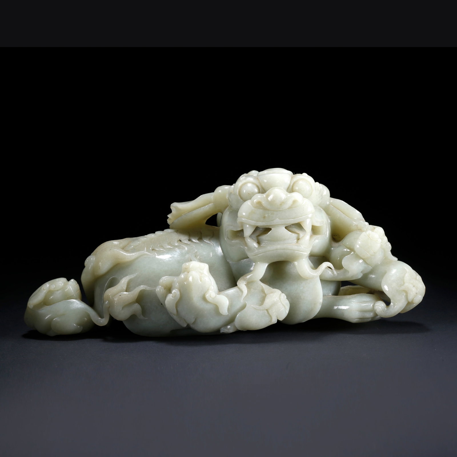 A HETIAN JADE ORNAMENT CARVED WITH LARGE LION AND CUB LION: Hetian Jade Ornament Carved with Large Lion and Cub Lion