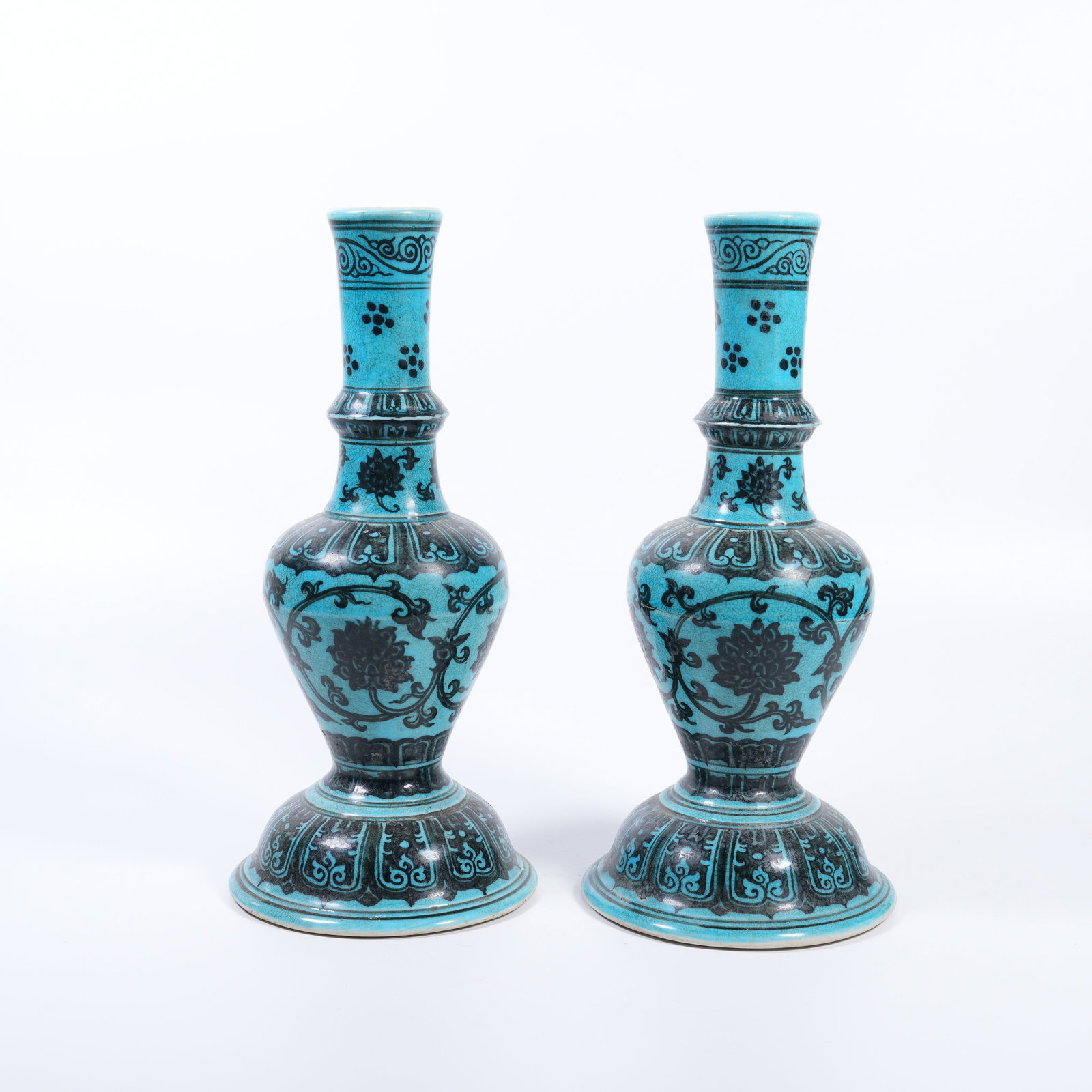 A PAIR OF PEACOCK-BLUE GLAZED VAIRAVAKA BOTTLES WITH INK-PAINTED INTERLOCKING FLORAL SCROLLS: Pair of Peacock-Blue Glazed Vairavaka Bottles with Ink-Painted Interlocking Floral Scrolls