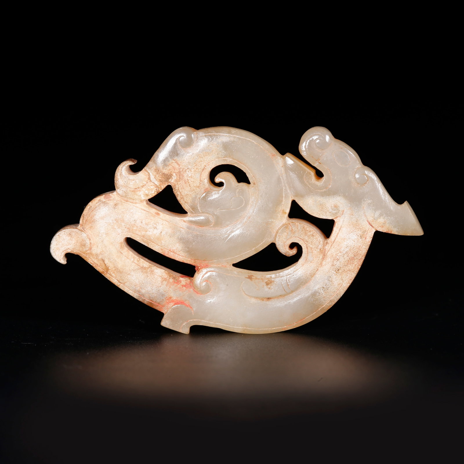 A BEAST-SHAPED PENDANT OF ANCIENT JADE: Beast-shaped Pendant of Ancient Jade
