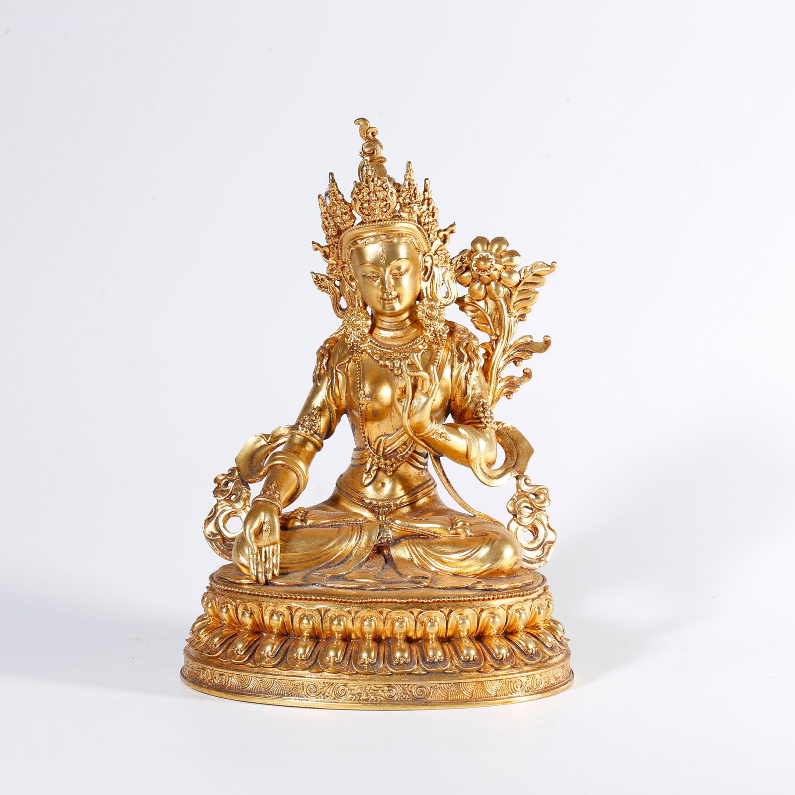 A GILT BRONZE STATUE OF PADMAPANI AVALOKITESHVARA: Gilt Bronze Statue of Padmapani Avalokiteshvara