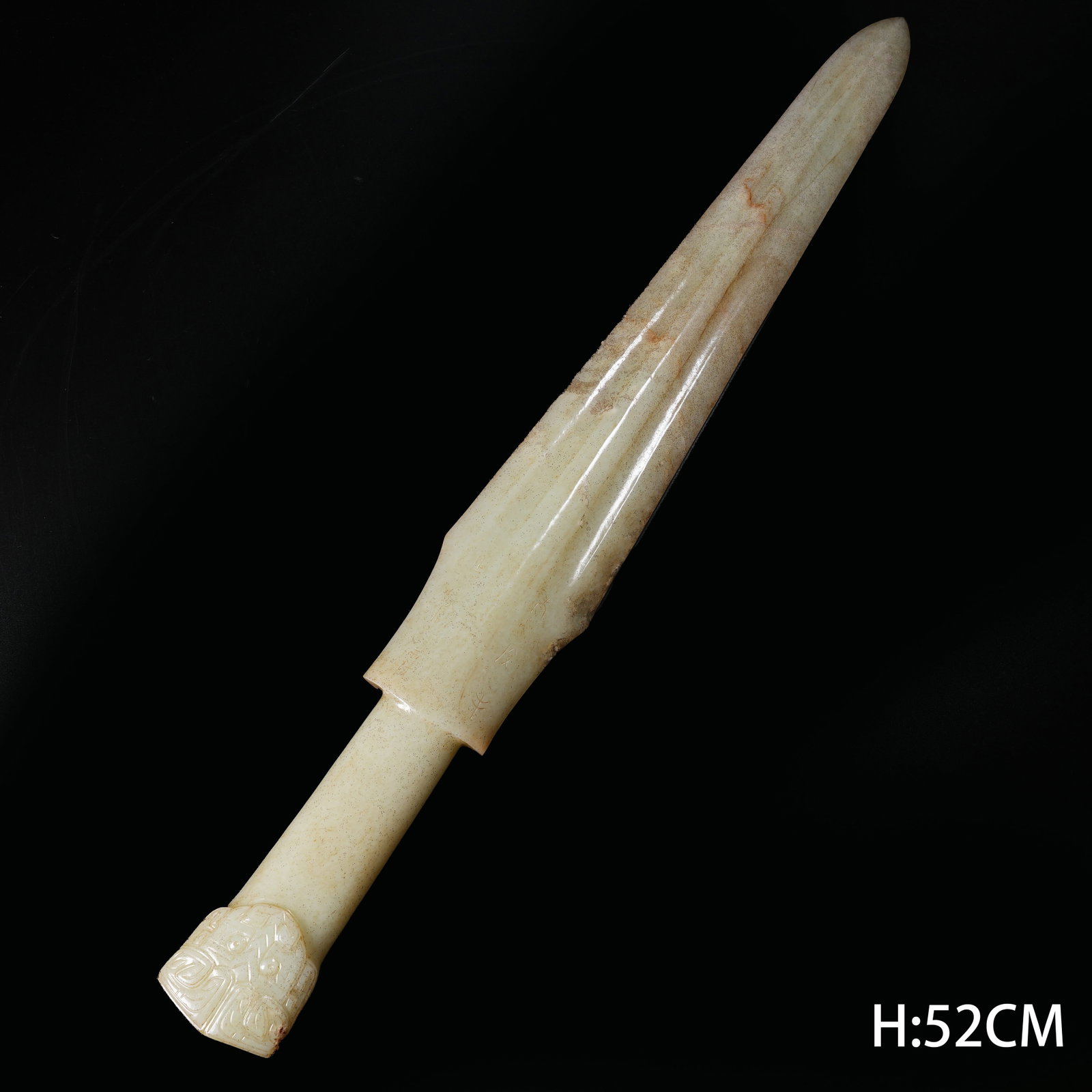 A ANCIENT JADE SWORD CARVED WITH DIVINE FIGURES AND INSCRIPTIONS: Ancient Jade Sword Carved with Divine Figures and Inscriptions