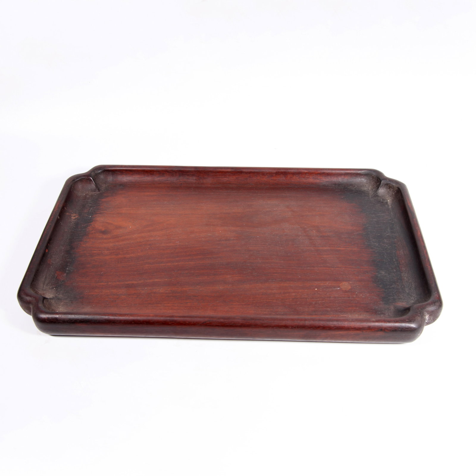 A RED WOOD FOUR-CONCAVE-CORNER PLATE: Red wood four-concave-corner plate