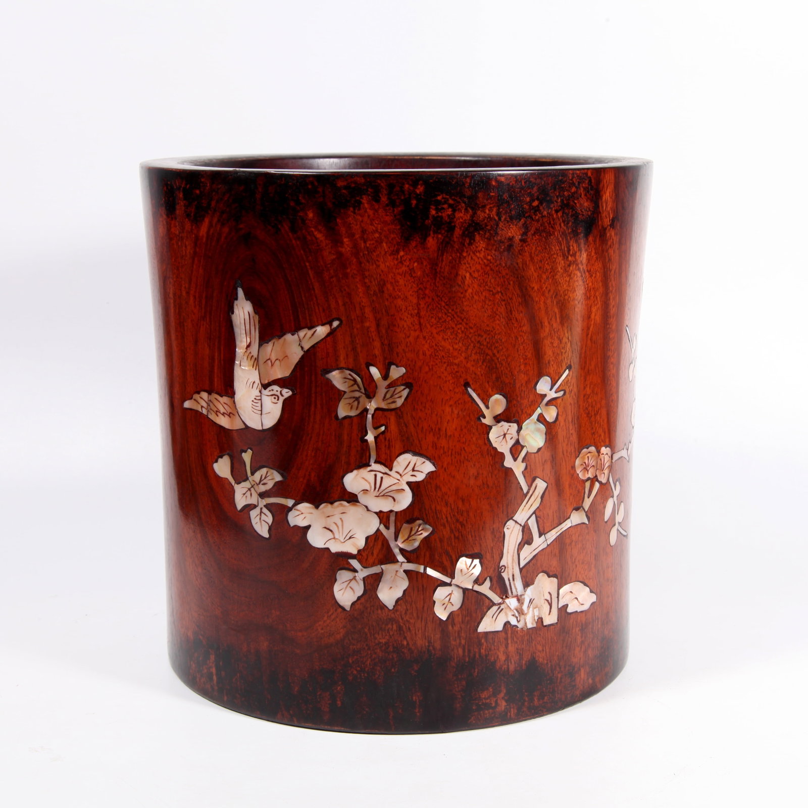 A HUANGHUALI WOOD BRUSH POT CARVED WITH FLOWER-AND-BIRD PATTERN INLAID WITH MOTHER-OF-PEARL: Huanghuali wood brush pot carved with flower-and-bird pattern inlaid with mother-of-pearl