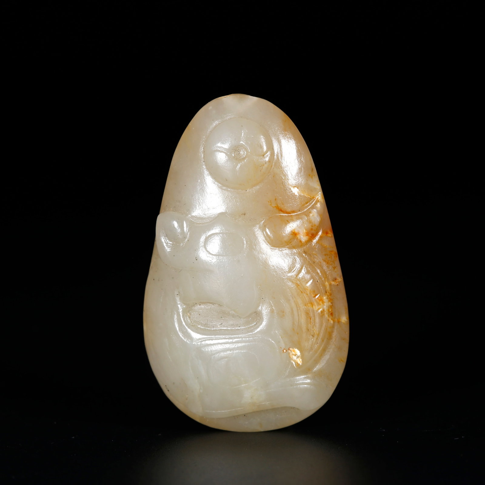 A DRAGON-PATTERN PENDANT OF HETIAN JADE: Dragon-pattern Pendant of Hetian Jade