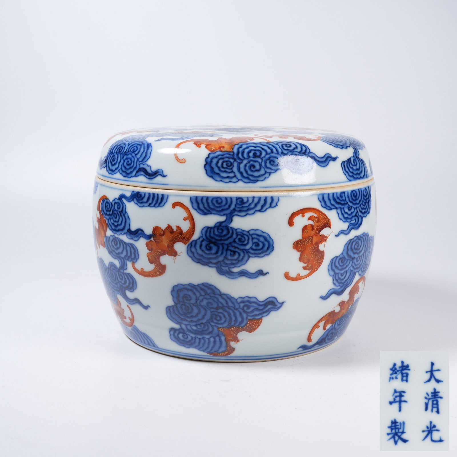 A COVERED JAR WITH UNDERGLAZE BLUE, IRON RED AND GILDED "BOUNDLESS BLESSINGS" MOTIF (1 of 9)