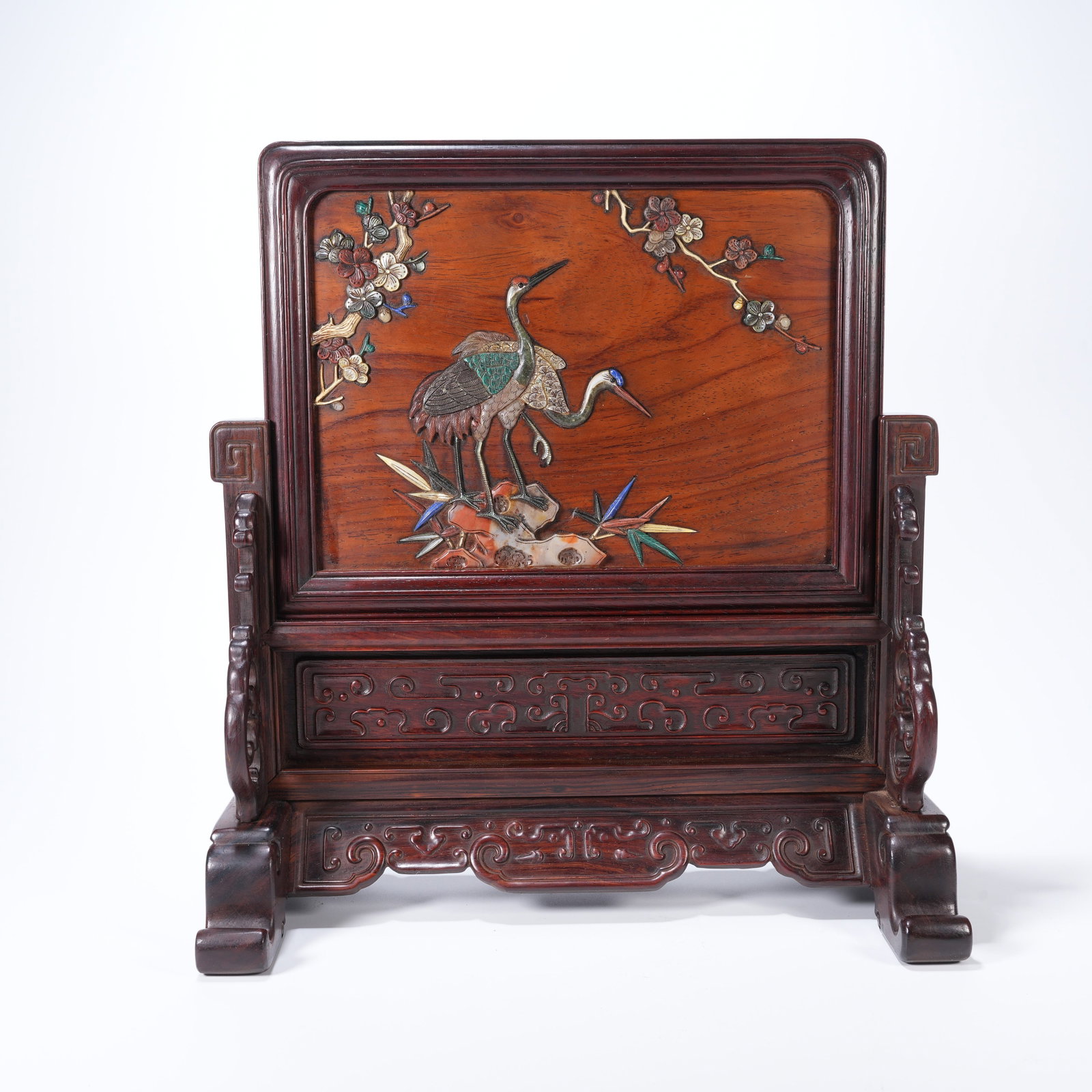 A HUANGHUALI TABLE SCREEN WITH PRECIOUS-STONE INLAY DEPICTING PINE AND CRANES FOR LONGEVITY: Huanghuali table screen with precious-stone inlay depicting pine and cranes for longevity