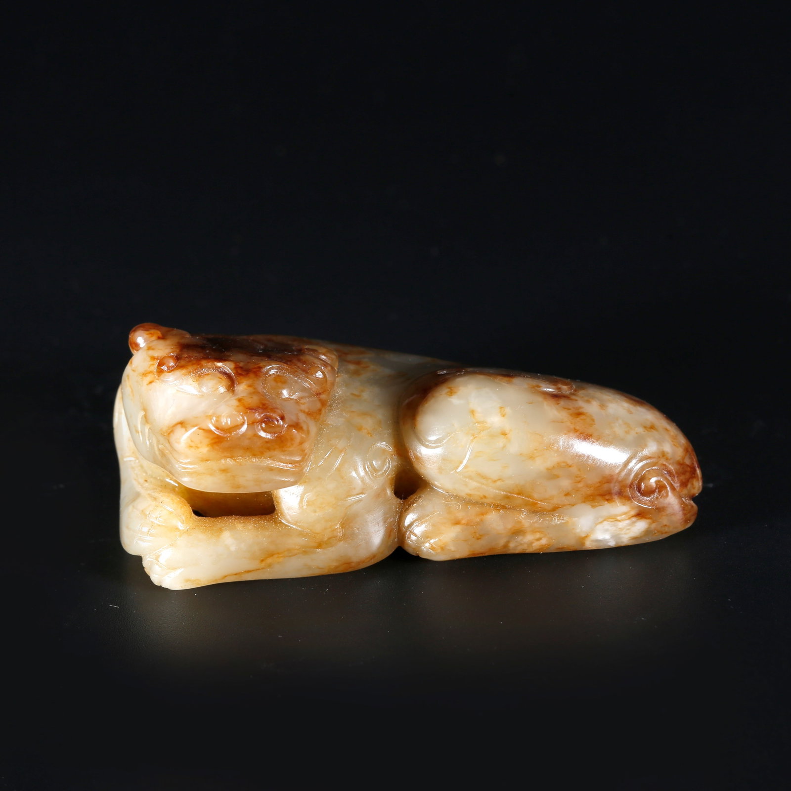 A HETIAN JADE BEAST-SHAPED ORNAMENT (1 of 8)