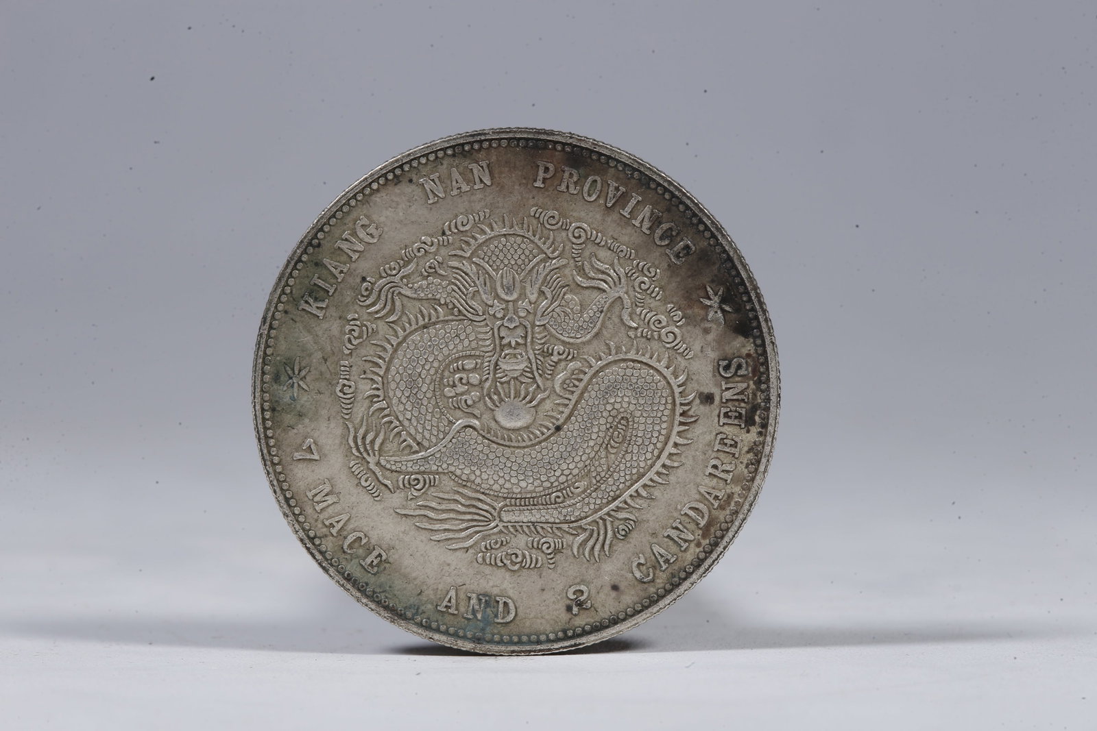 A SILVER DOLLAR COIN - 3