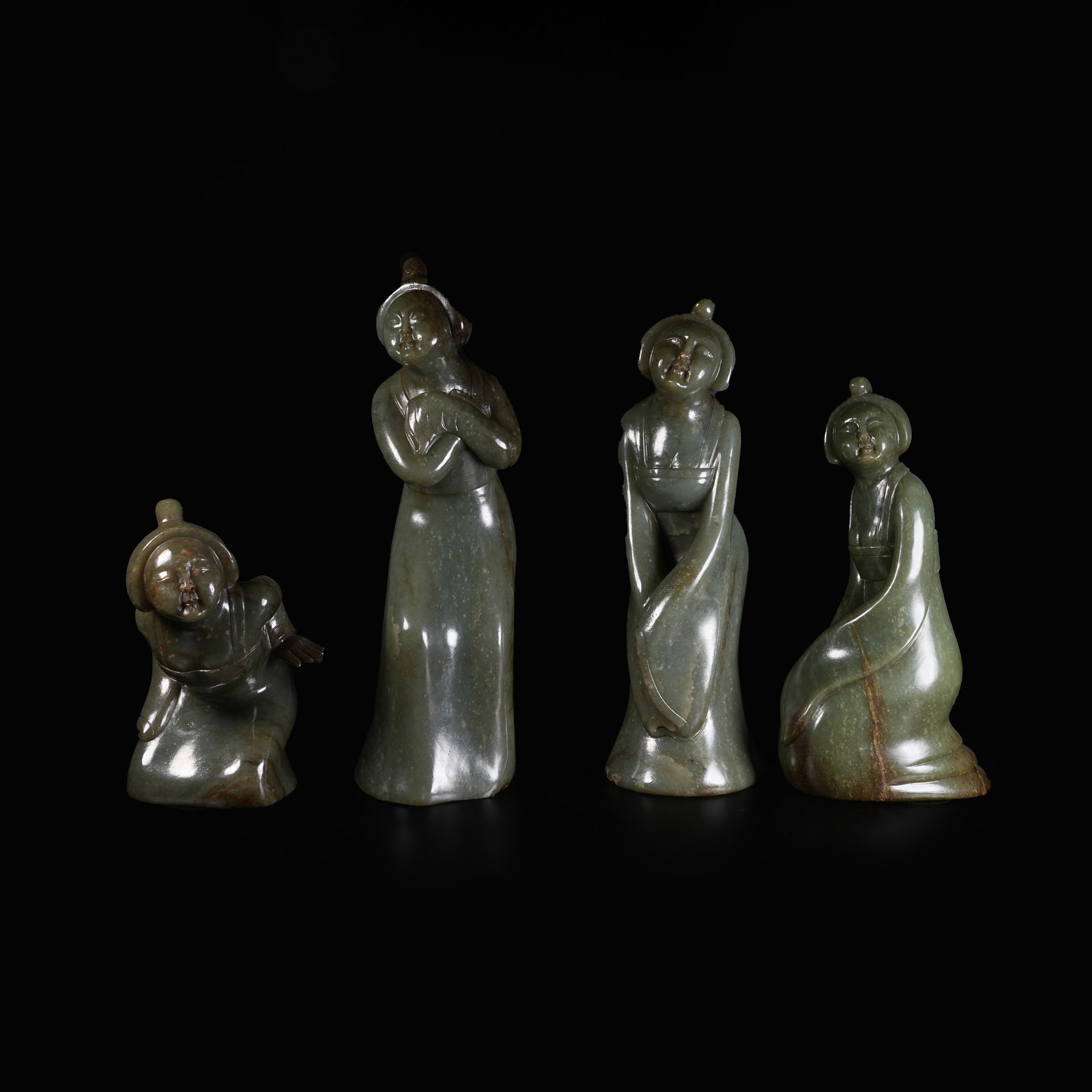 A GROUP OF ANCIENT JADE DANCING FIGURE PENDANTS (1 of 13)
