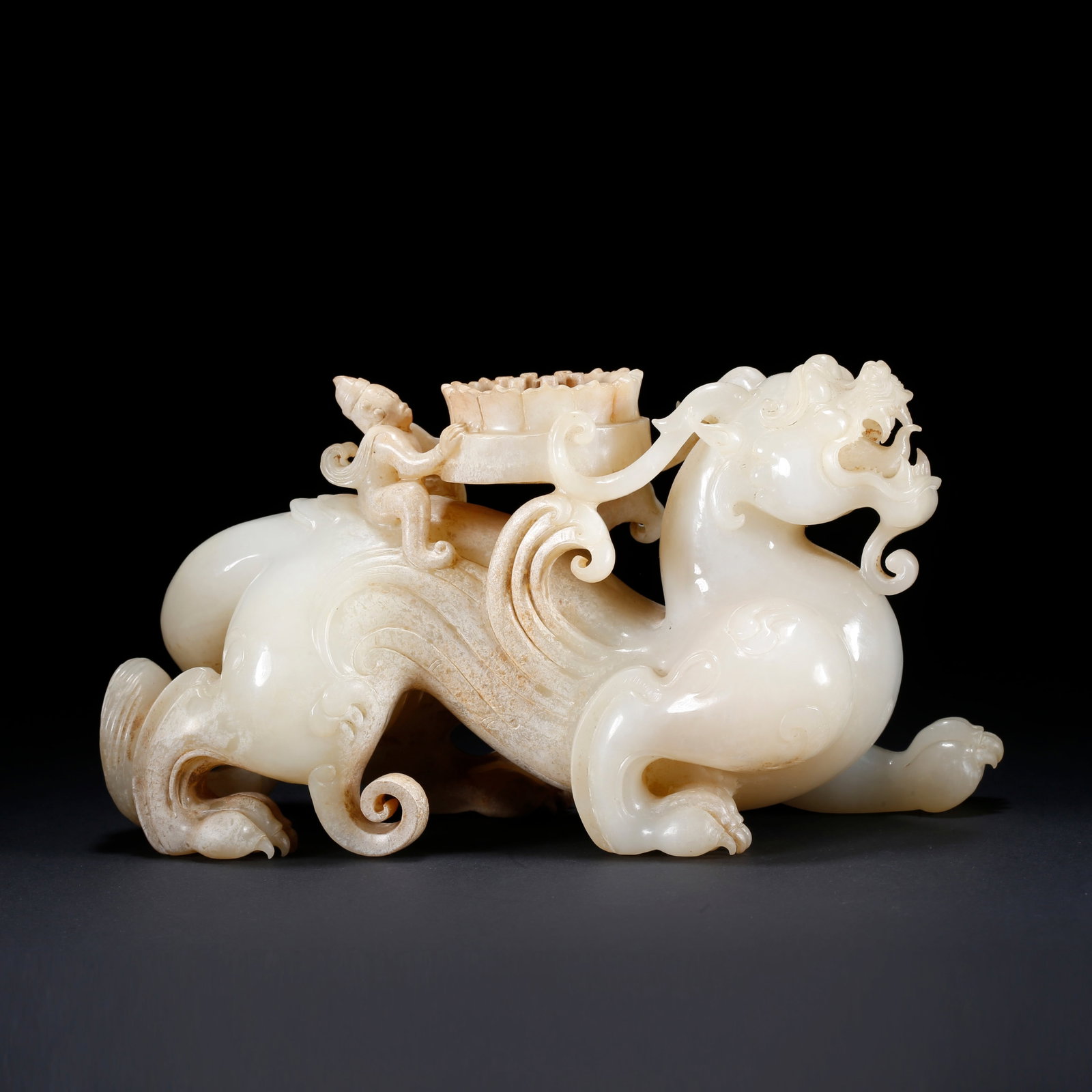 A HETIAN JADE BEAST-SHAPED ORNAMENT (1 of 10)