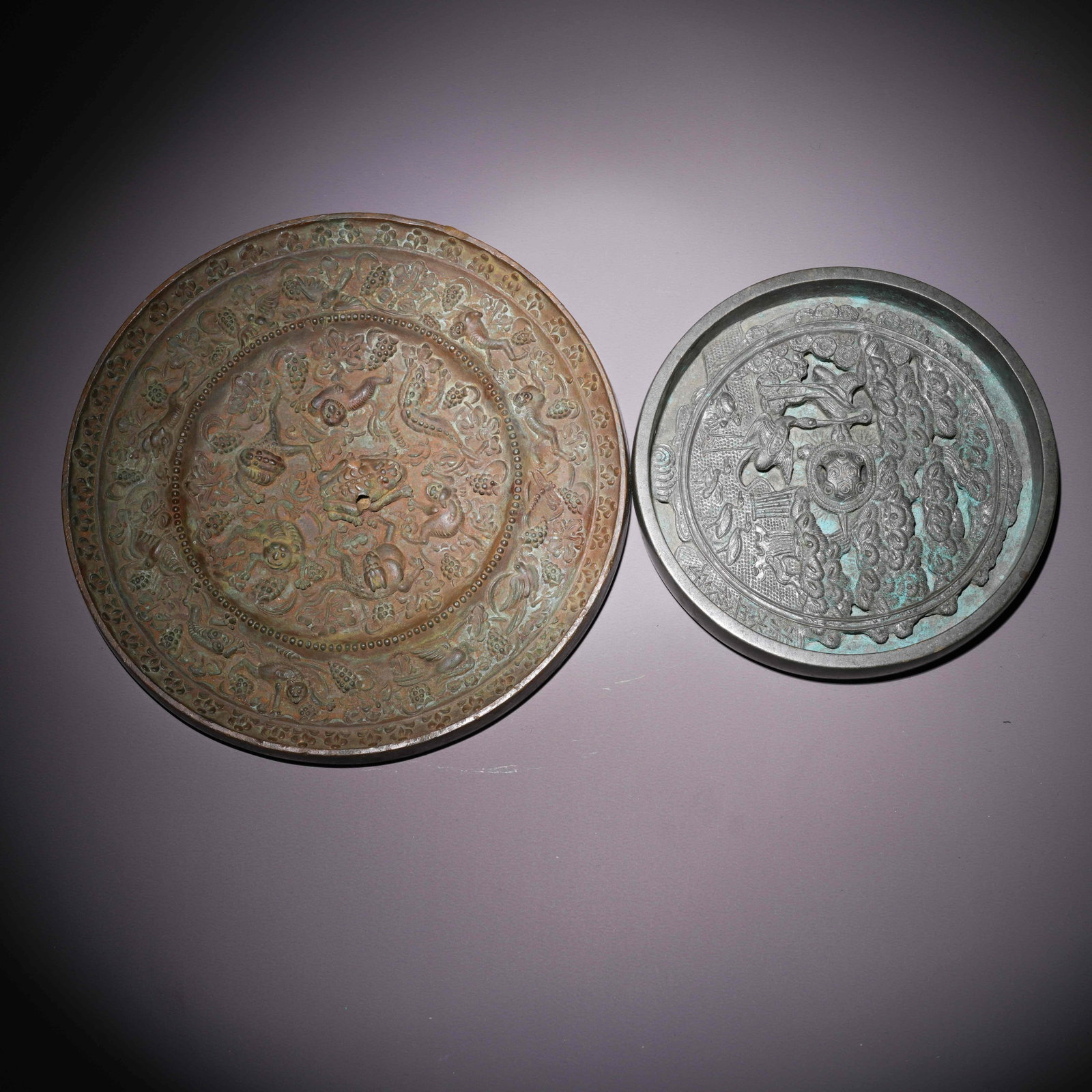 A SET OF BRONZE MIRRORS (1 of 9)