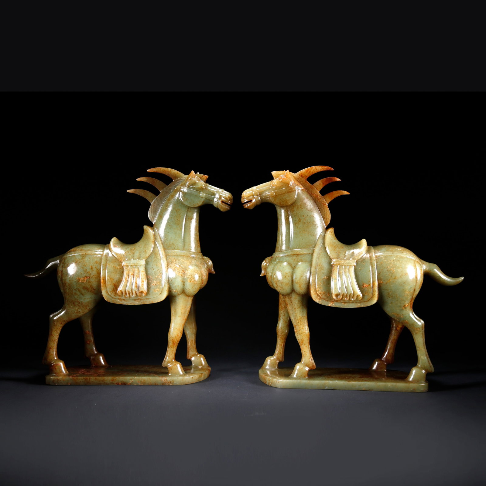 A PAIR OF HETIAN JADE ORNAMENTS IN SHAPE OF STEEDS (1 of 9)
