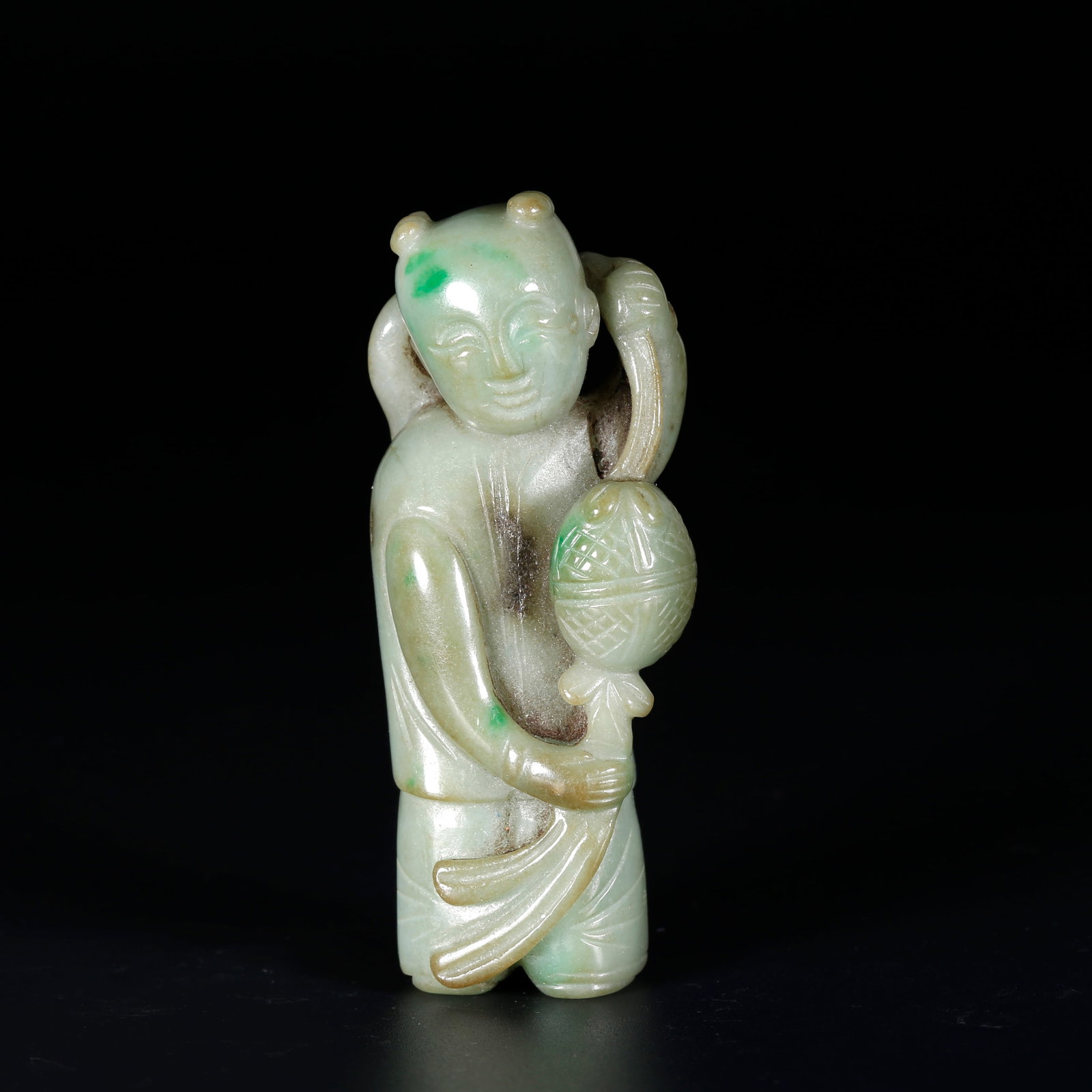 A JADEITE ORNAMENT CARVED AS CHILD (1 of 9)