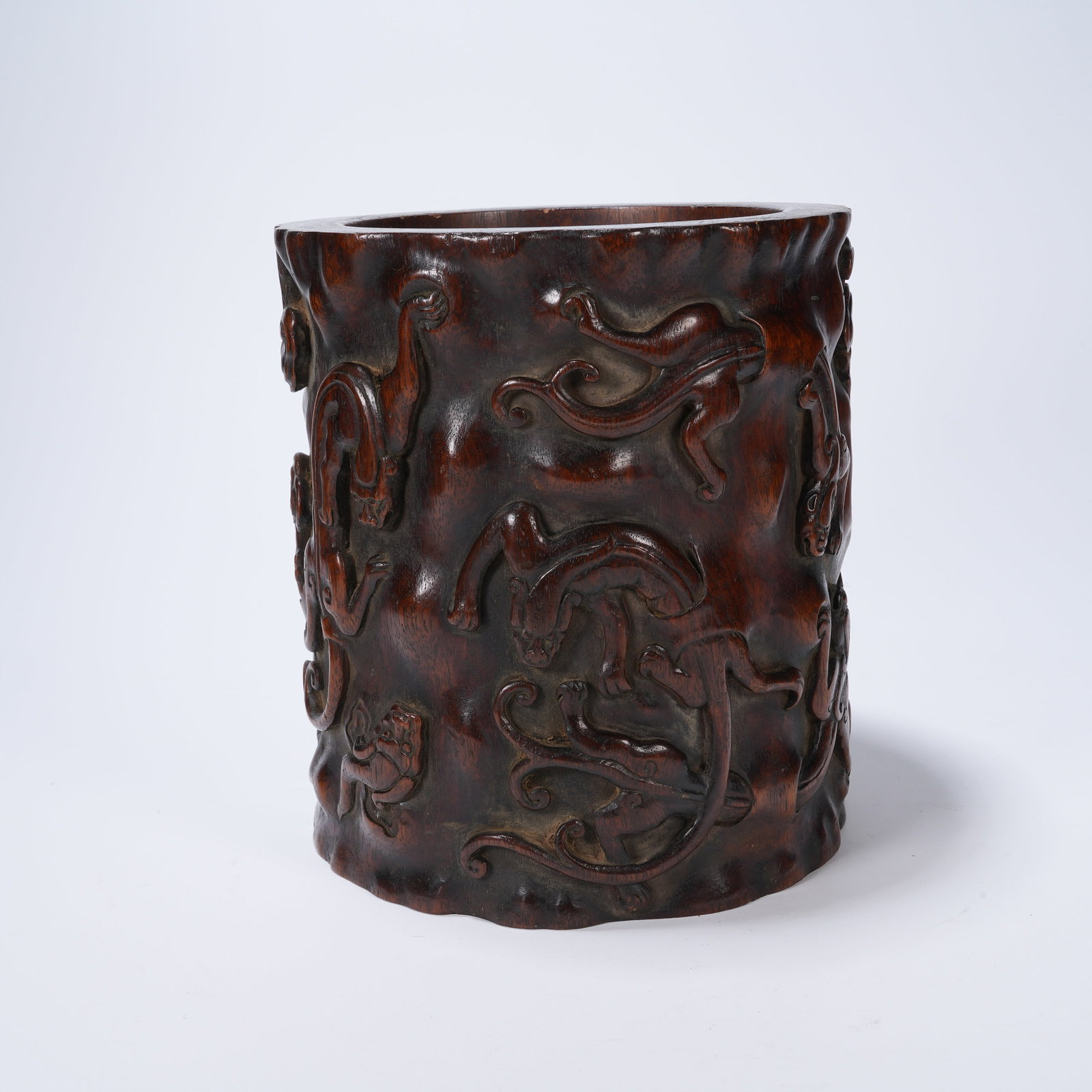 A HUANGHUALI BRUSH POT WITH CHI-DRAGON PATTERNS (1 of 9)