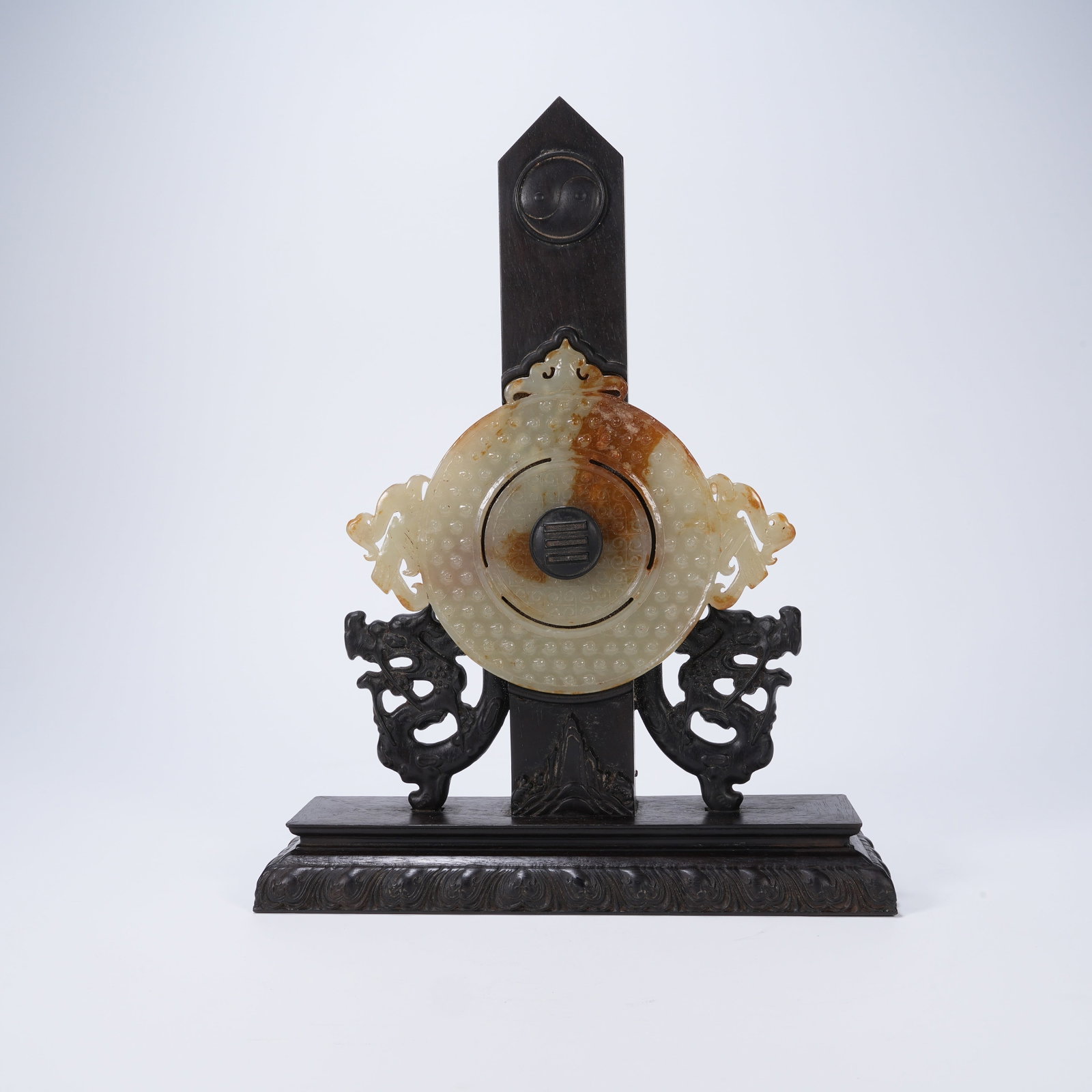 A ARCHAIC JADE OPENWORK BI-DISC WITH BIRD PATTERNS (1 of 9)