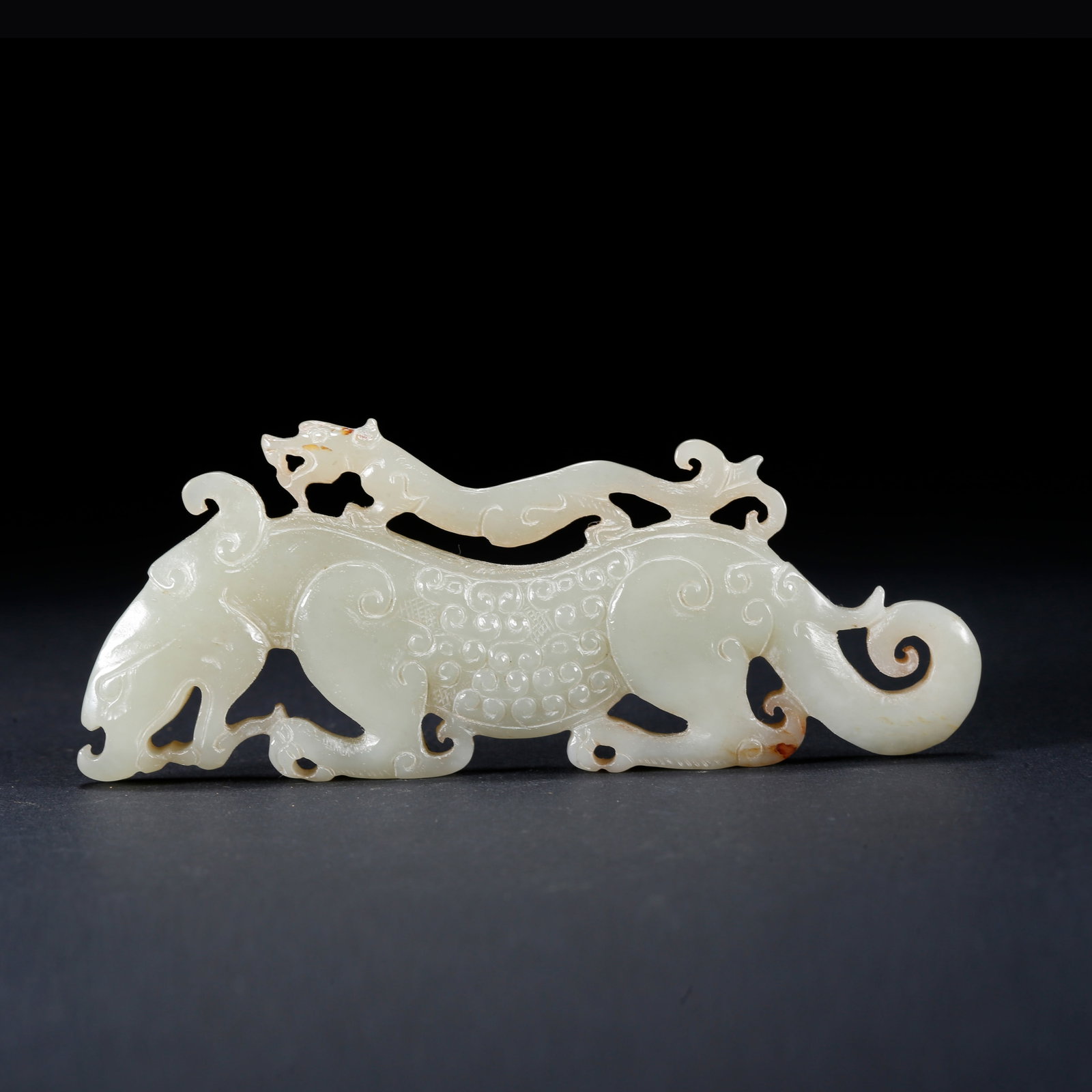 A ARCHAIC JADE MOTHER AND CUB BEAST PENDANT: Archaic Jade Mother and Cub Beast Pendant