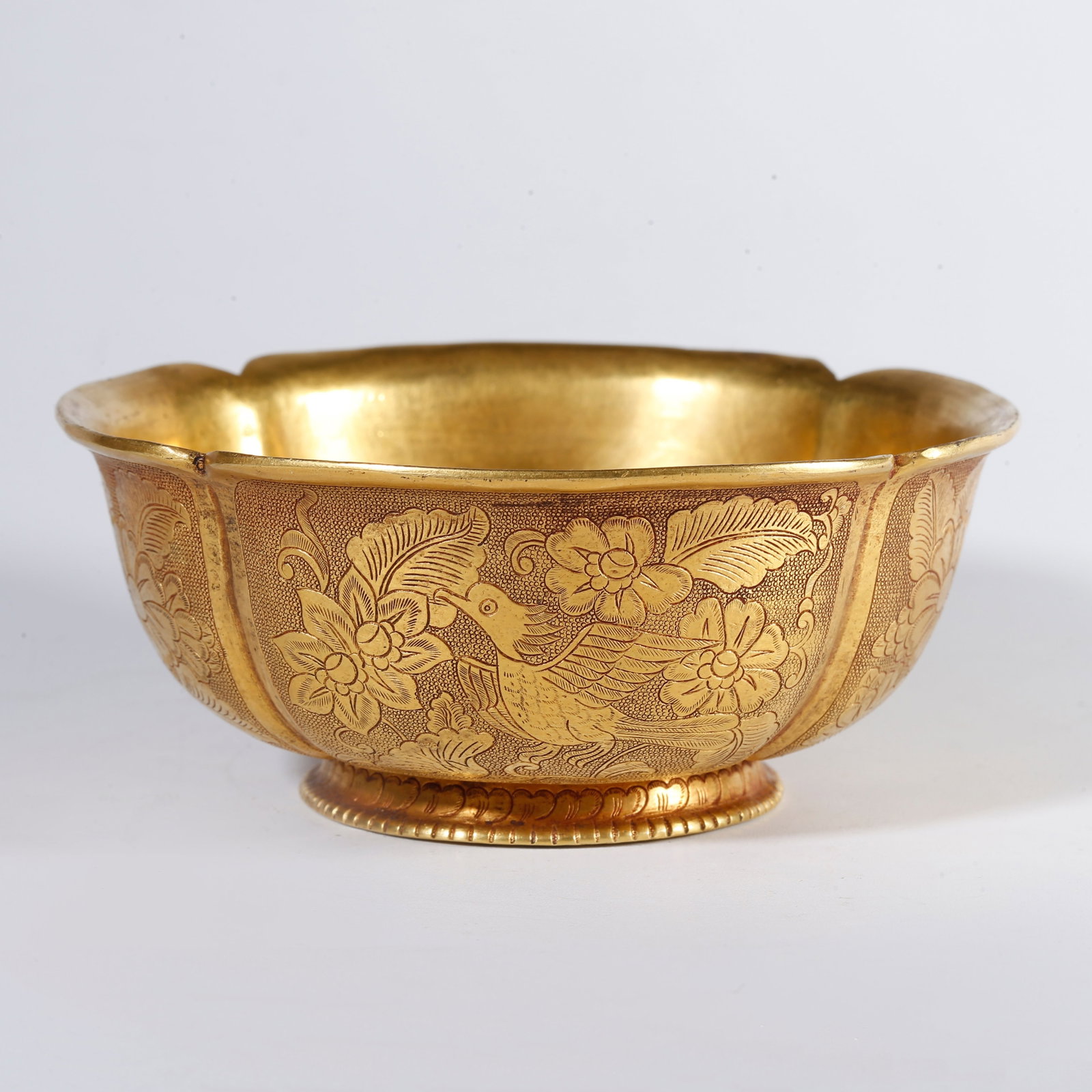 A GILT BRONZE BOWL WITH FLOWER AND BIRD PATTERN (1 of 9)