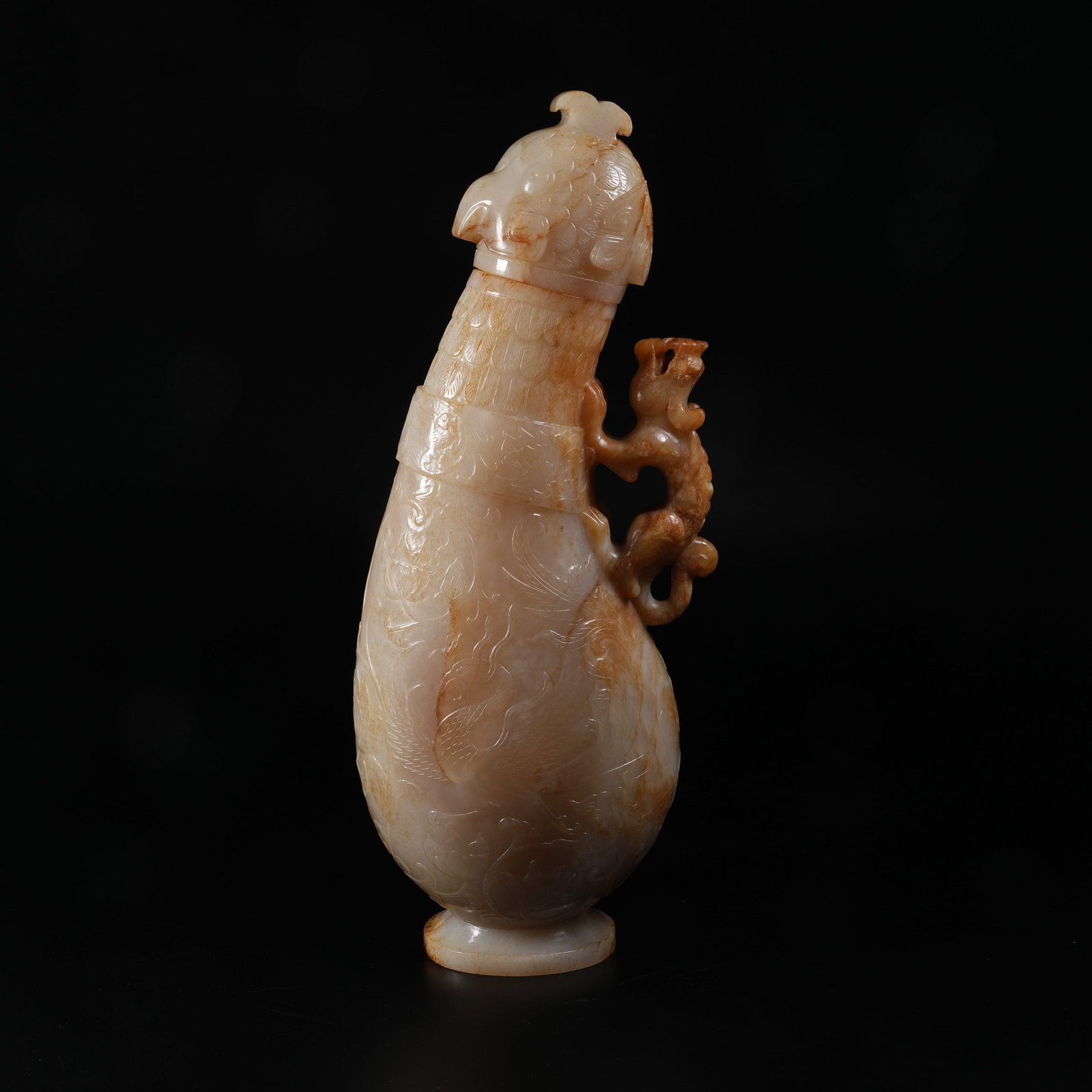 A ANCIENT JADE COVERED POT WITH DRAGON PATTERNS, PHOENIX HEAD SPOUT AND BEAST HANDLE: Ancient Jade Covered Pot with Dragon Patterns, Phoenix Head Spout and Beast Handle