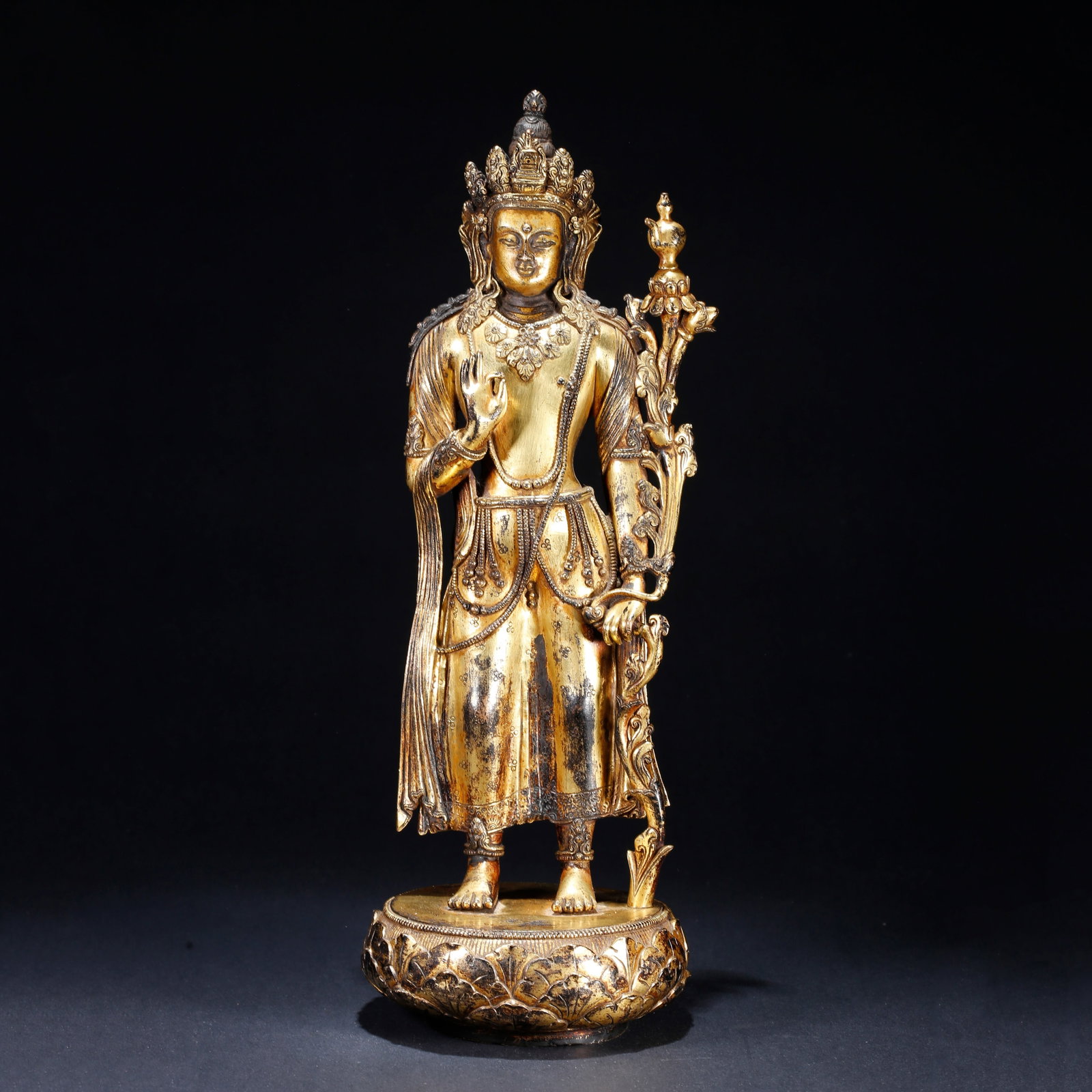 A GILT BRONZE STANDING BUDDHA STATUE (1 of 9)