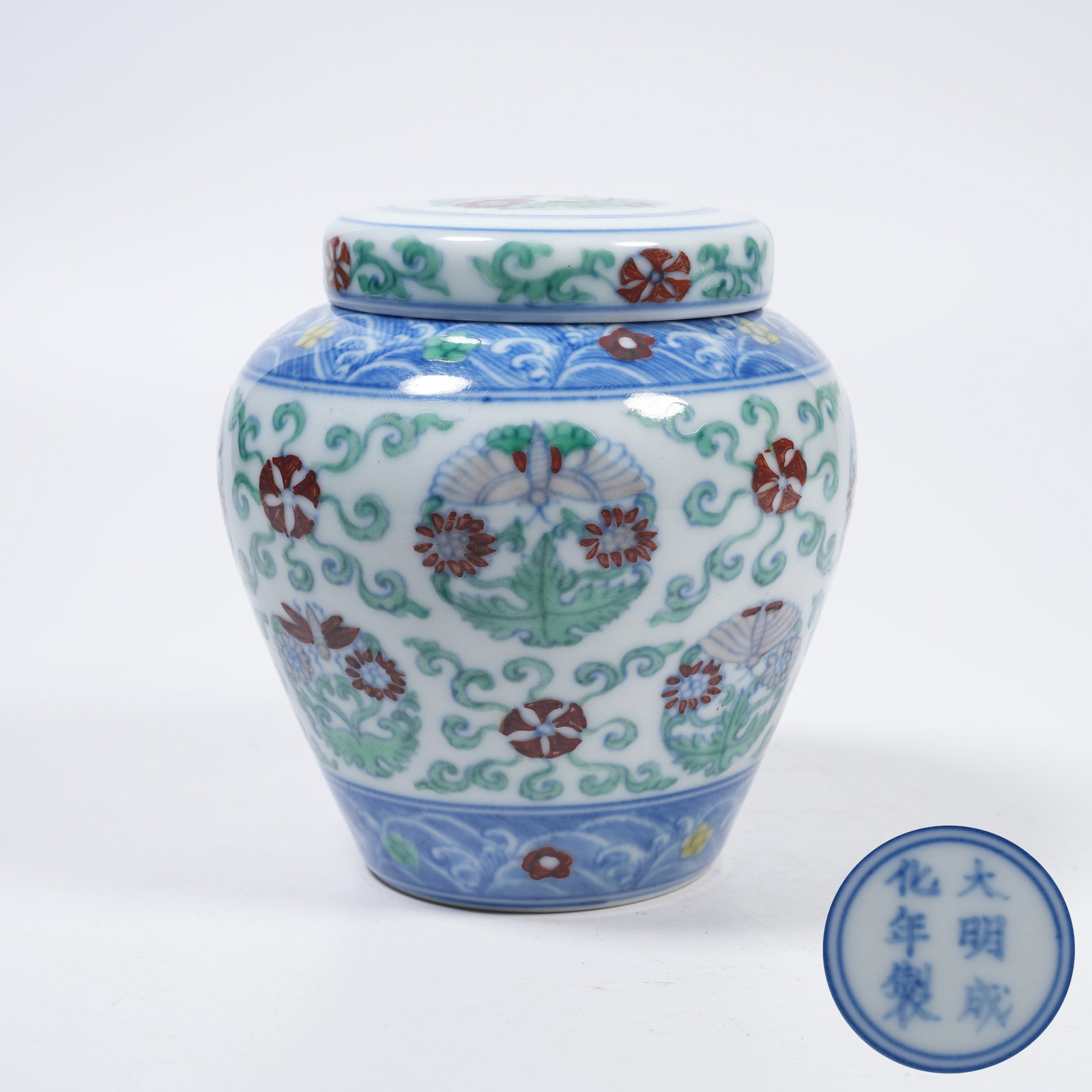 A DOUCAI COVERED JAR WITH BALL FLOWER PATTERNS (1 of 9)