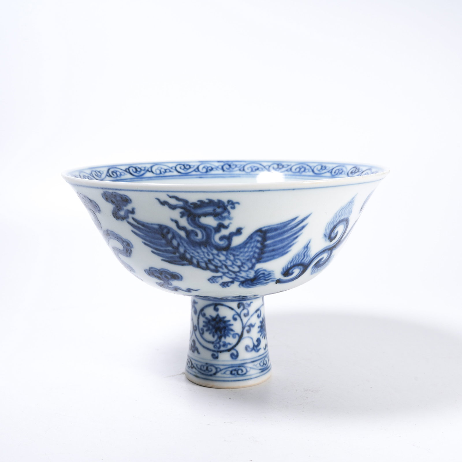 A BLUE AND WHITE STEM BOWL WITH PHOENIX PATTERN: Blue and White Stem Bowl with Phoenix Pattern