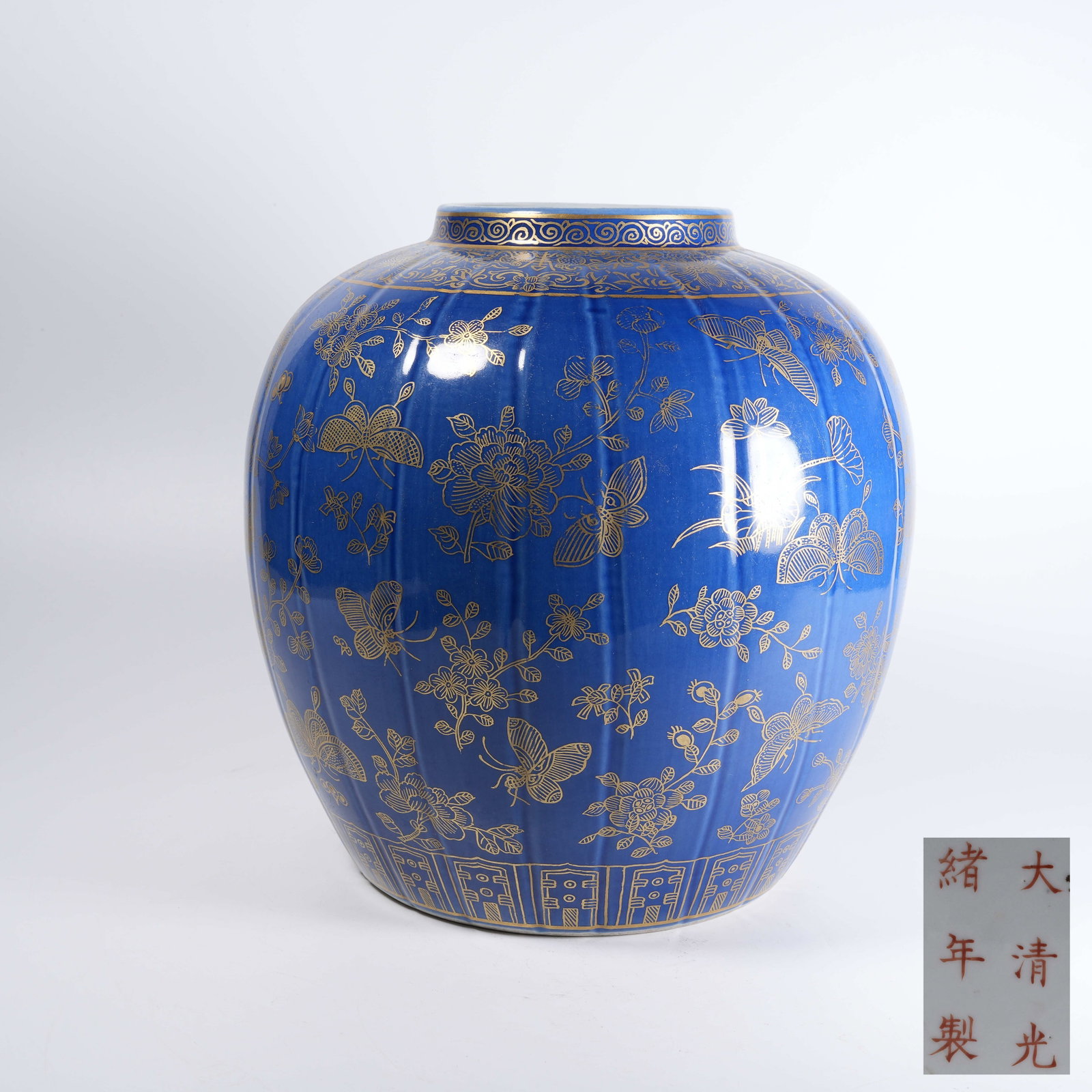 A SAPPHIRE BLUE GLAZE MELON-RIBBED JAR WITH GILDED FLOWER AND BUTTERFLY PATTERNS (1 of 9)