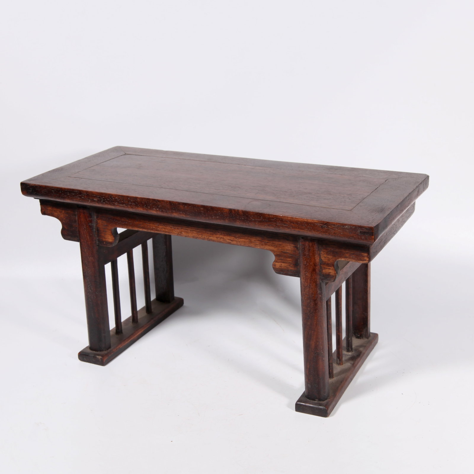 A HUANGHUALI WOOD FLAT-TOP LOW TABLE (1 of 8)