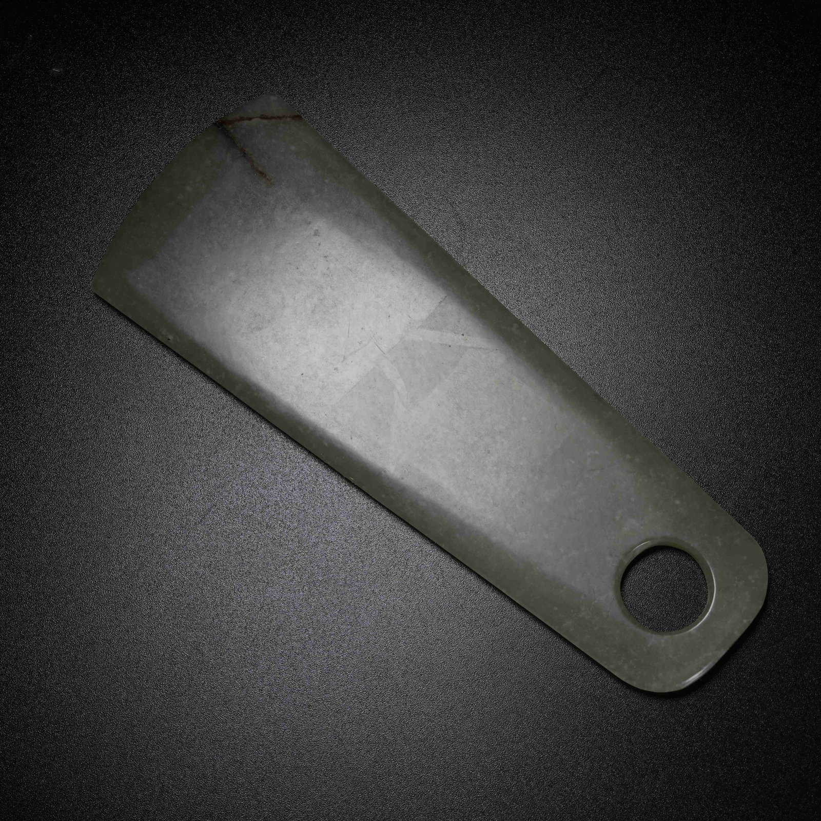 A ARCHAIC JADE AXE (1 of 8)