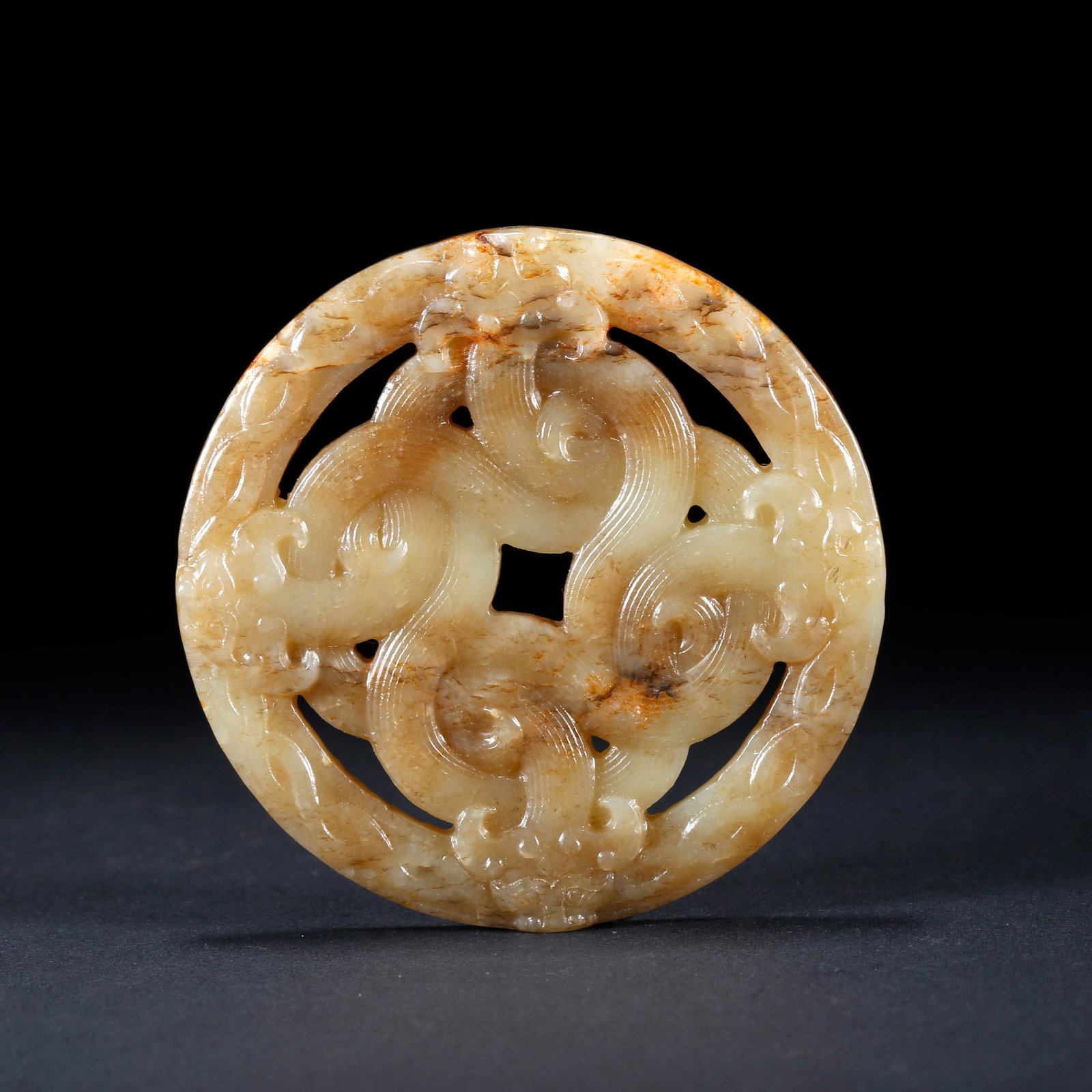 A HETIAN JADE PENDANT CARVED WITH DRAGON PATTERN (1 of 9)