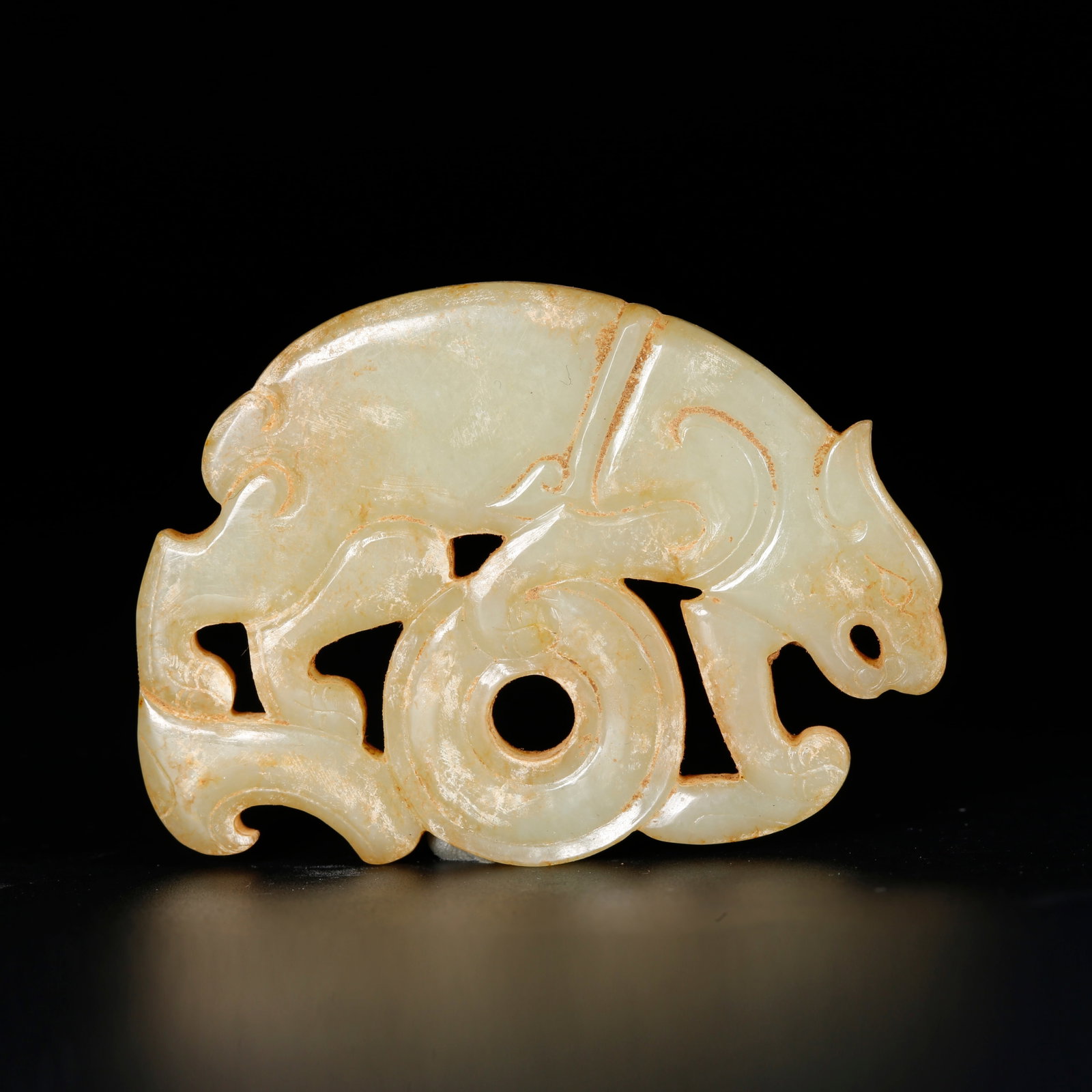 A BEAST-SHAPED PENDANT OF ANCIENT JADE (1 of 9)