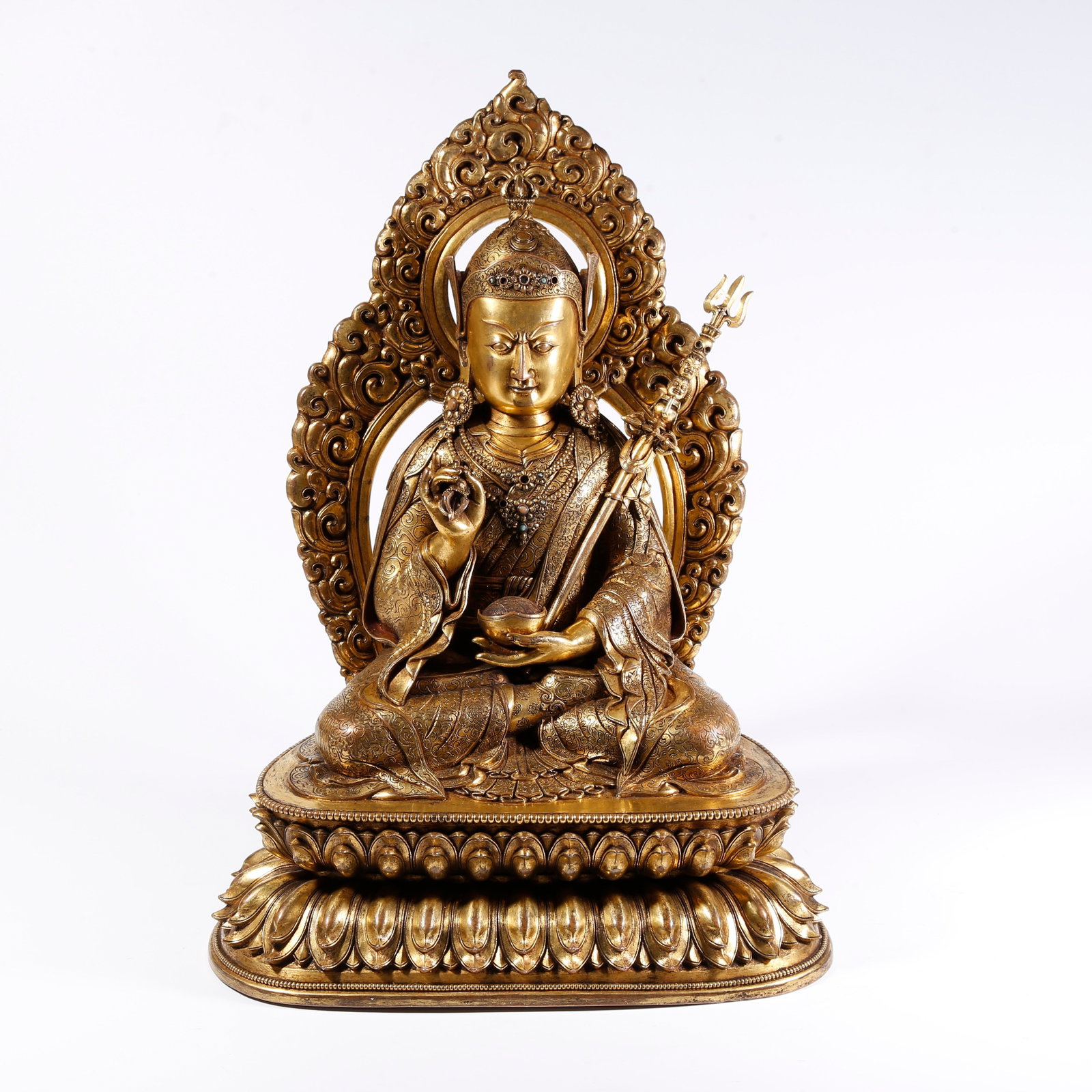 A GILT-BRONZE PADMASAMBHAVA FIGURE (1 of 9)