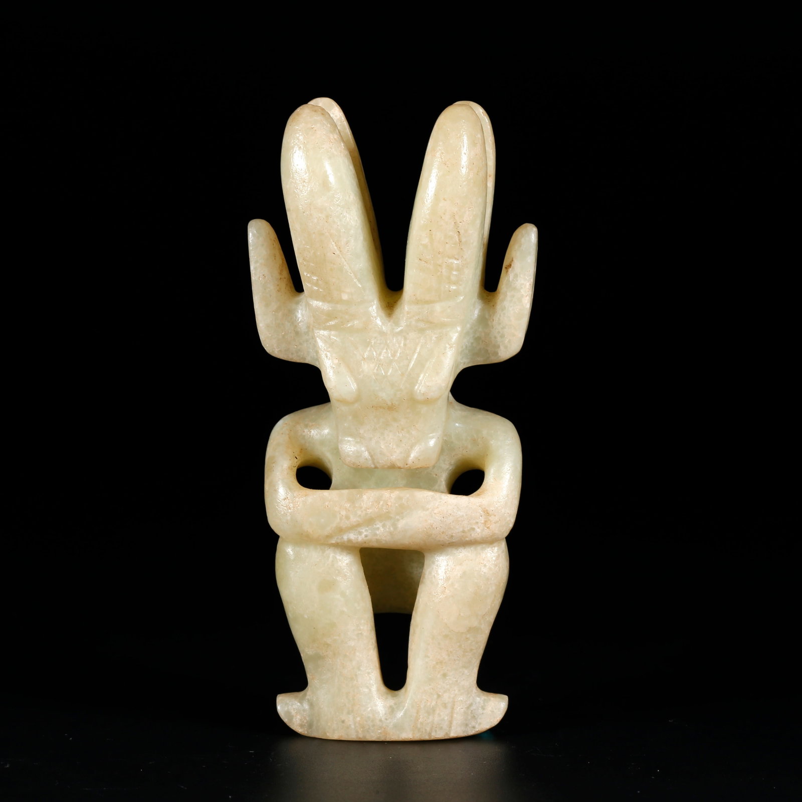 A ANCIENT JADE SUN GOD FIGURINE (1 of 9)