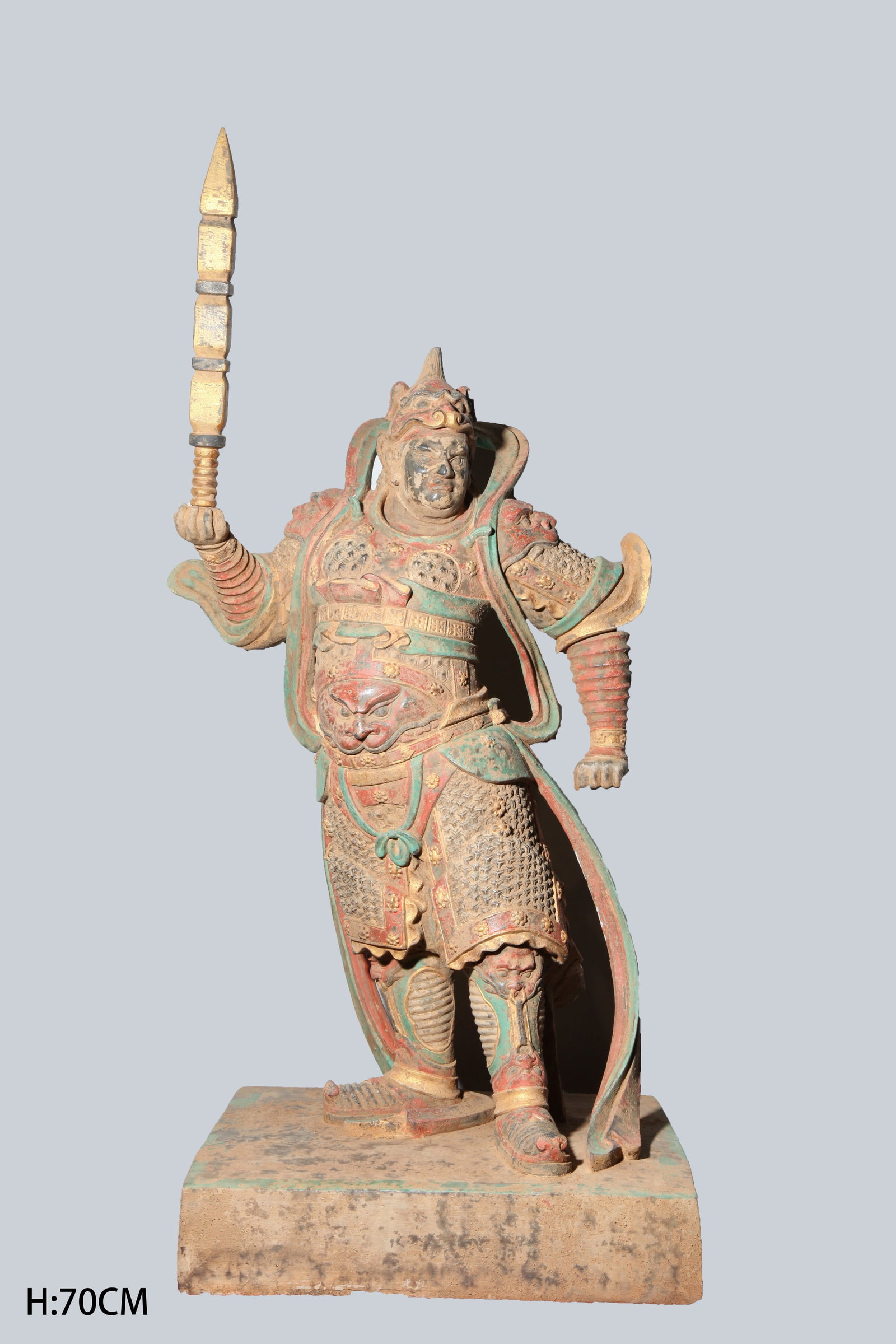A PAINTED CARVED BLUESTONE SKANDA DHARMA?PROTECTOR STATUE: Painted carved bluestone Skanda Dharma?protector statue