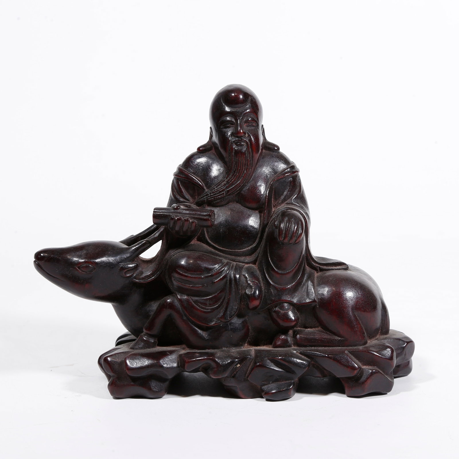 A FIGURE?SHAPED ORNAMENT CARVED IN ZITAN WOOD: Figure?shaped ornament carved in zitan wood