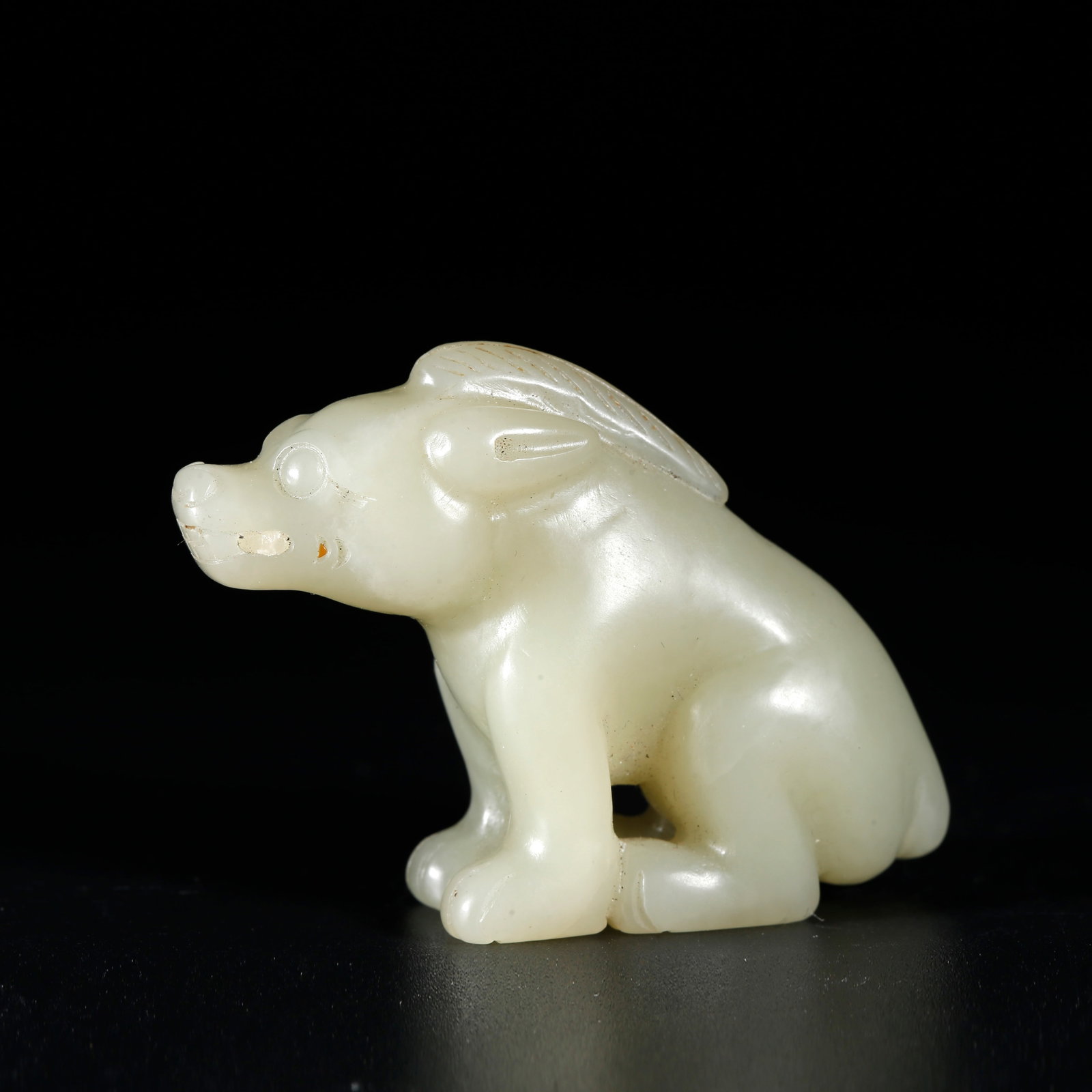 A HETIAN JADE BEAST-SHAPED ORNAMENT (1 of 9)