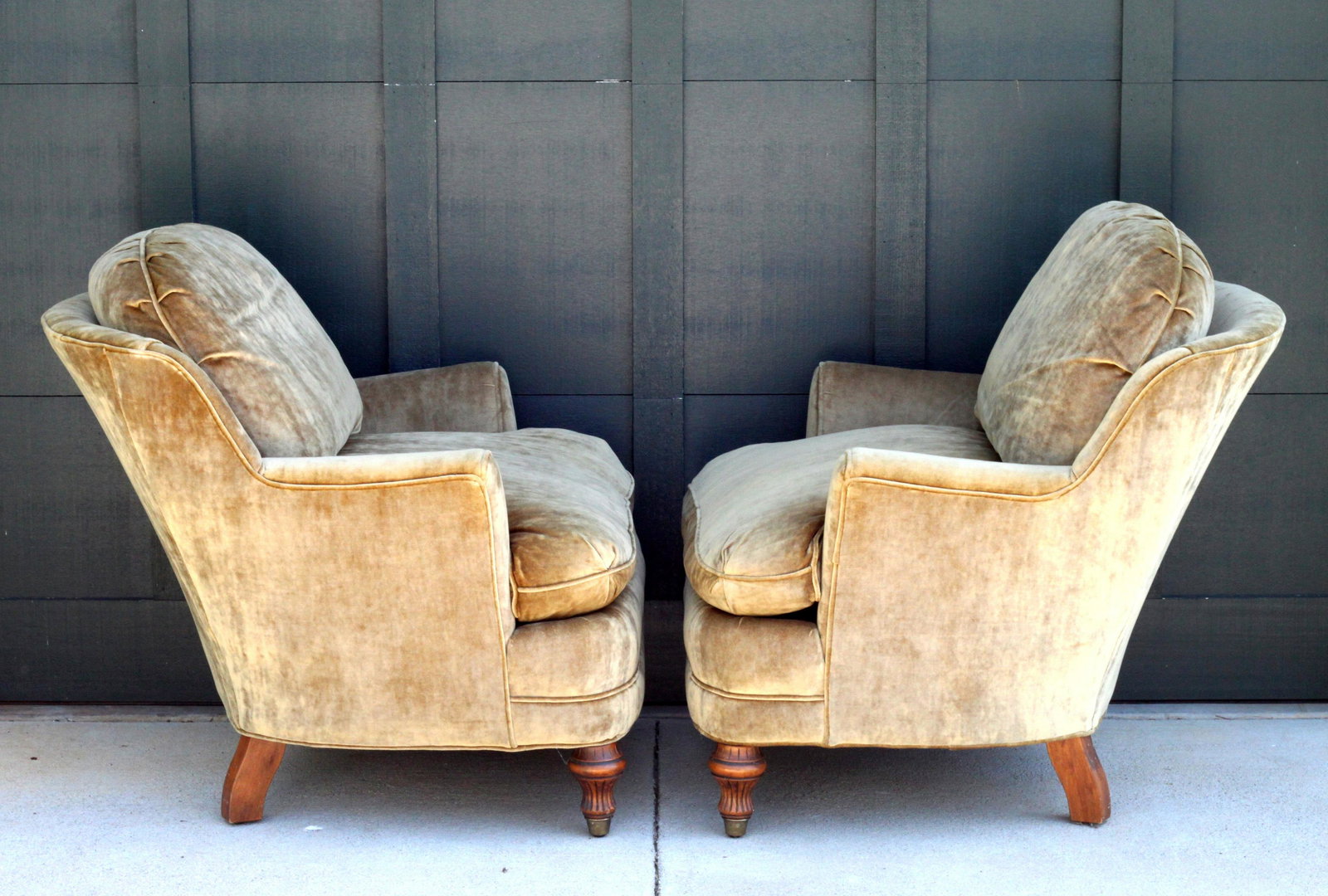 Custom English Roll Arm Velvet Club Chairs, a pair: A pair of English roll arm lounge chairs on bun feet custom made by Calico Corners in a versatile, neutral velvet. In the shade the velvet reads as a sage green. In the sun, the color is more of a cha