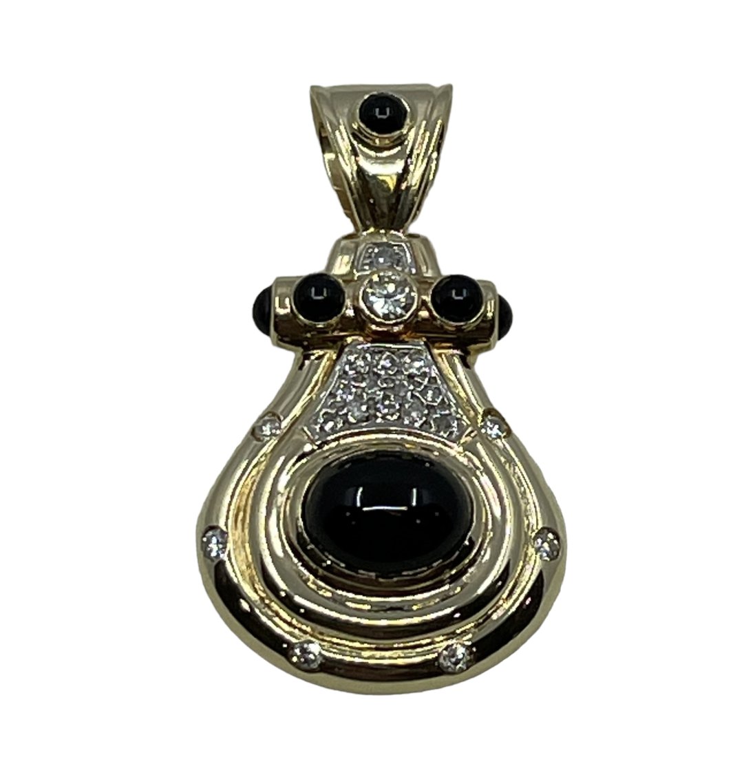 Diamond and Onyx and 14K Yellow Gold Pendent Etruscan Style: Etruscan Style Onyx and Diamond 14K Pendent • Measurements 40mm x 23mm x 8mm • 14K Yellow Gold • 9.4 Grams