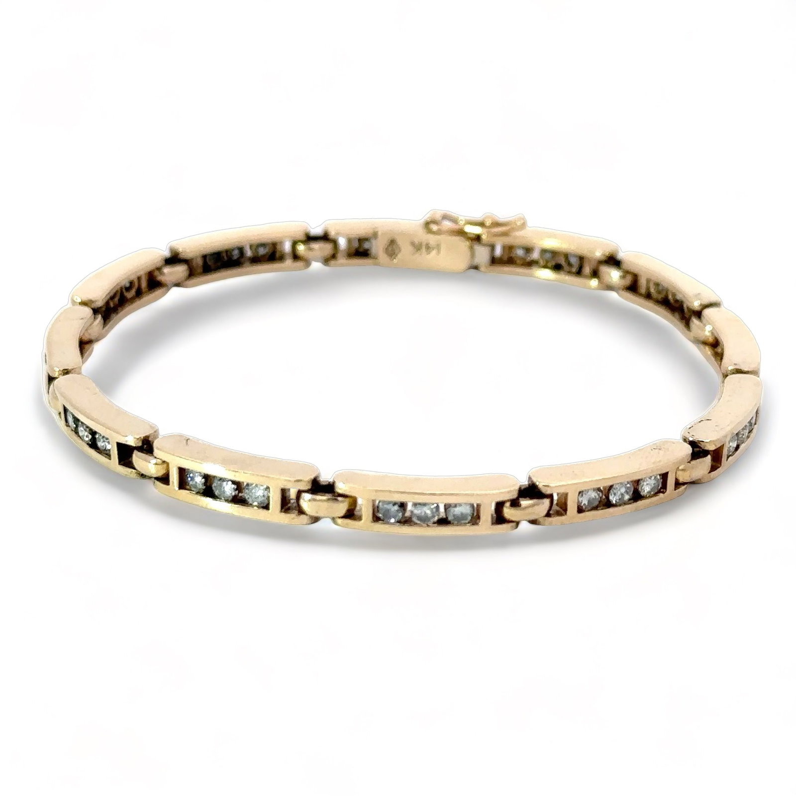 Womens Vintage Estate Gold Diamond Tennis Bracelet 14K: Line Tennis Bracelet 14K Solid Yellow Gold • 36 channel set round diamonds (1.8mm - 2mm) • VS1 • CTW 0.95 - 1.08 approx • 16 grams • 14K Yellow Gold • 7" inches