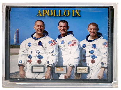 Apollo 9 - Flight Flown Triple Artifact Display in Acrylic Presentation Display Certified by Jerry: Apollo 9 artifact display featuring three certified flight-flow artifact segments. The artifacts include a segment of an Apollo 9 flown famous quote sourced from mission Lunar Module Pilot Rusty