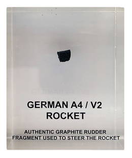 German A4/V2 Rocket - Flight Flown Graphite Rudder Relic in Florian Noller Acrylic Presentation: German A4/V2 Rocket flight flown graphite rudder fragment used to steer the rocket. The relic is encapsulated in a 3 x 4 x 1.25" acrylic display.The acrylic display has some surface