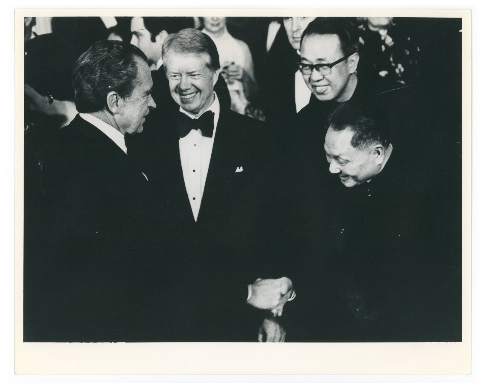 Richard Nixon, Jimmy Carter & Premier Deng Ziaooping of China - Vintage Press Photograph: Details: Richard Nixon, Jimmy Carter & Premier Deng Ziaooping of China, vintage 8 x 10" glossy silver gelatin press photograph. Near fine condition. Includes press markings on verso. Authent