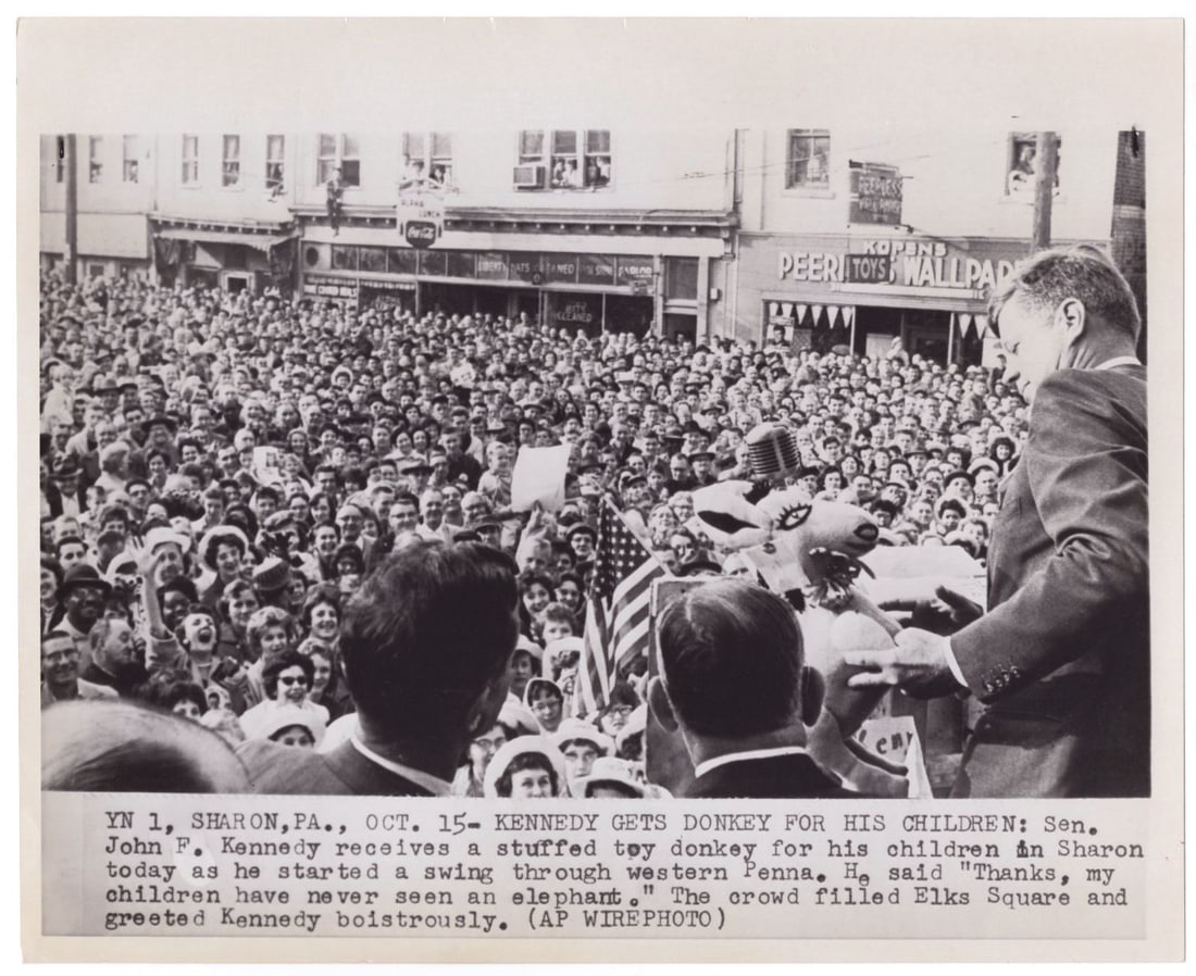 John F. Kennedy – Presidential Campaign Trail – 1960 Wire Service Photo – Pennsylv: Details: John F. Kennedy original vintage wire service photograph, capturing the Democratic presidential candidate addressing a massive crowd during a campaign stop in Sharon, Pennsylvania, on