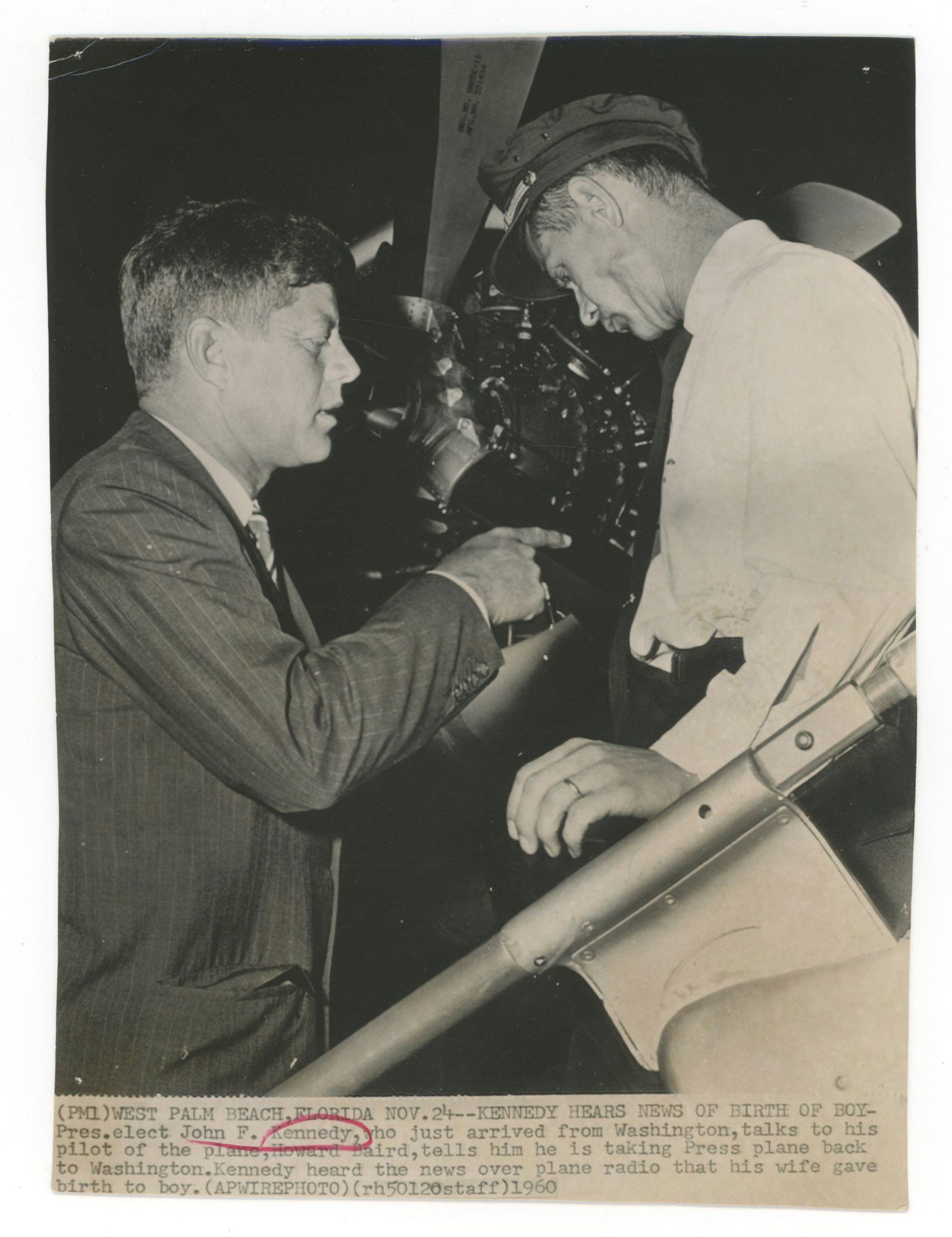 John F. Kennedy Learns of JFK Jr. Birth Aboard Plane – Original Press Photograph – Nov.  (1 of 1)