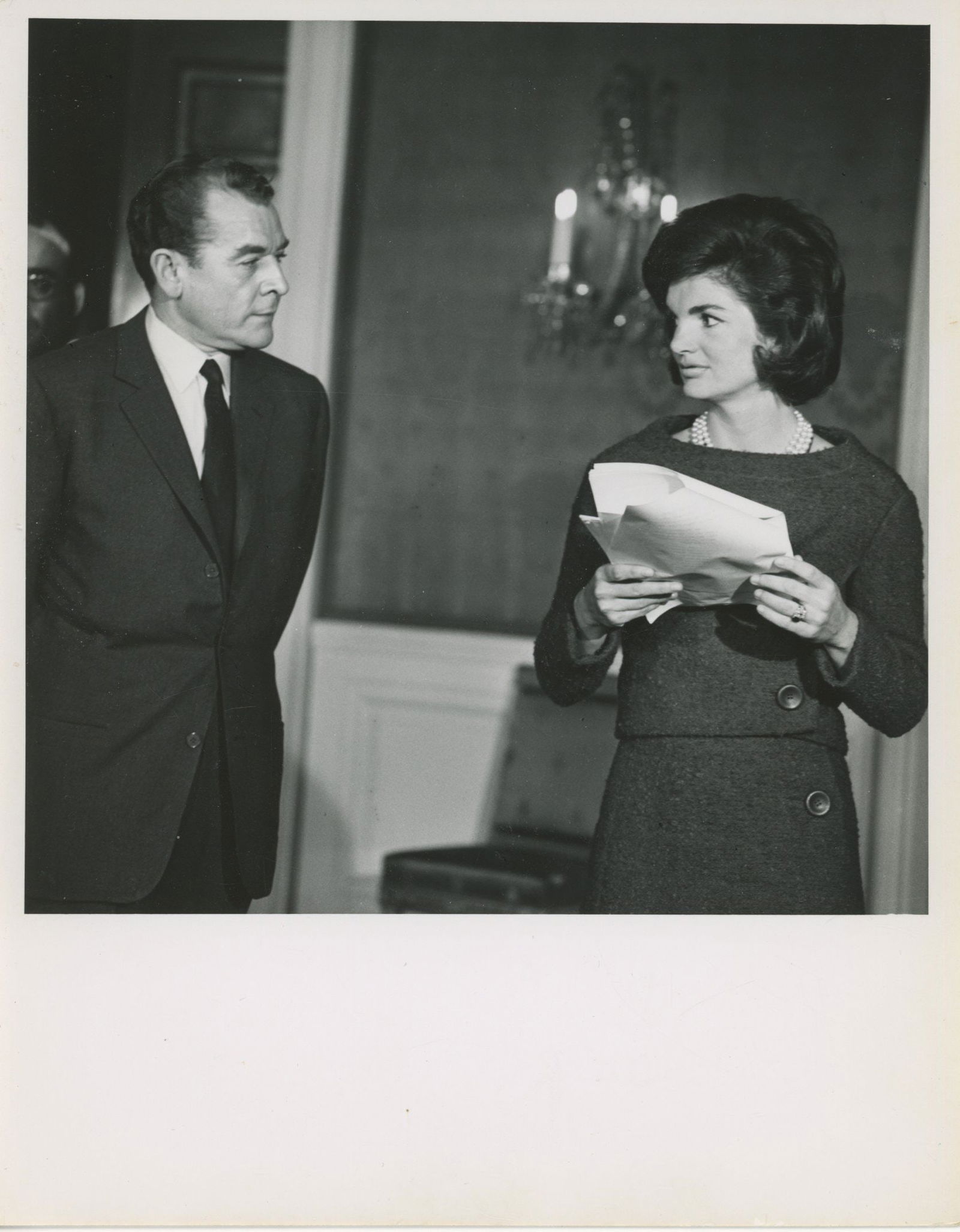 Jacqueline Kennedy "A Tour of the White House with Mrs. John F. Kennedy" 7 x 9" Original Press Photo: Details: Jacqueline Kennedy original 7 x 9 inch black-and-white press photograph depicting the First Lady during preparations for “A Tour of the White House with Mrs. John F. Kennedy.”