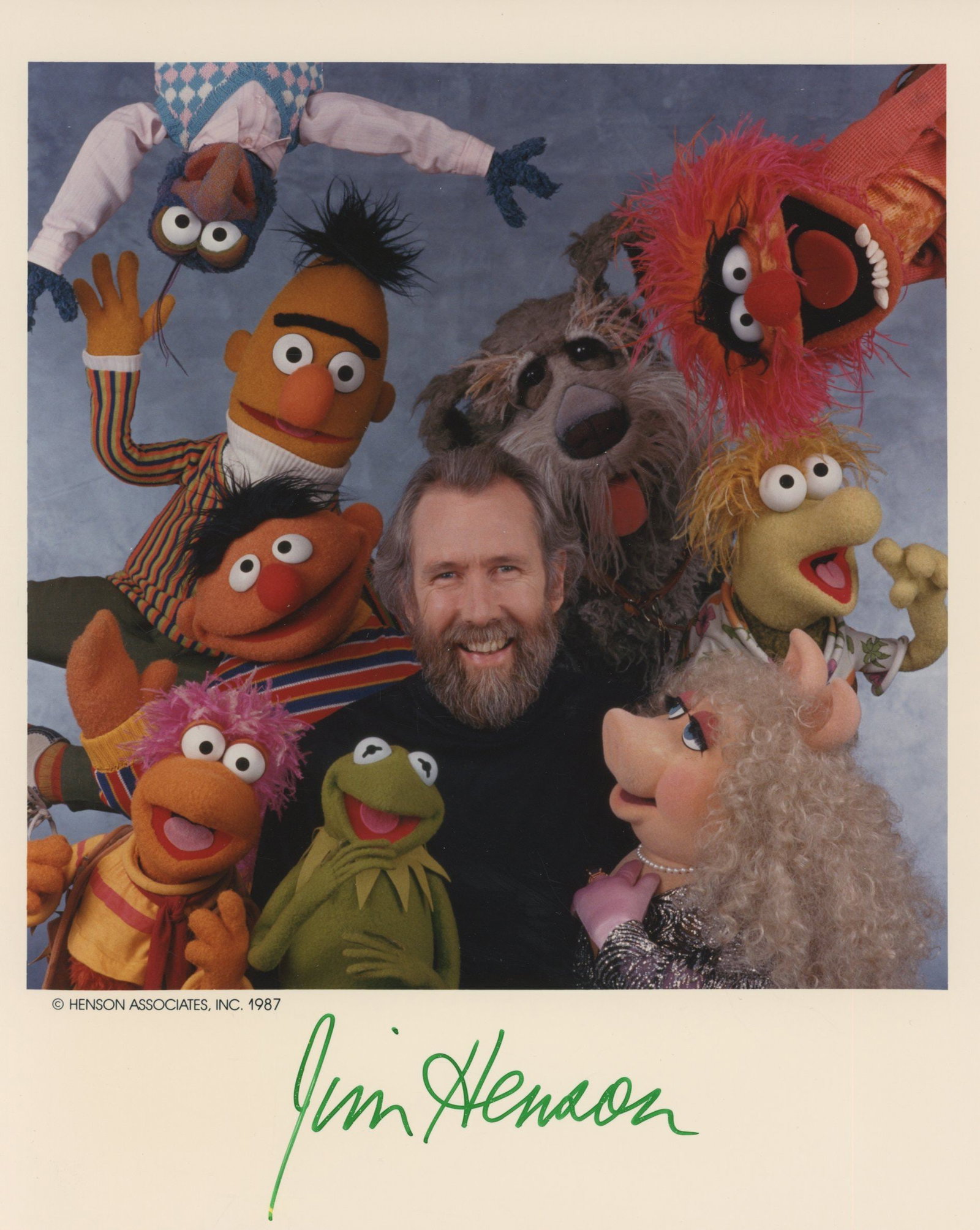 Jim Henson – Creator of the Muppets – Autographed 8 x 10 Photograph – Muppets Port: Details: Jim Henson autographed 8 x 10” glossy photograph depicting Henson surrounded by many of his most beloved Muppet characters including Kermit the Frog, Miss Piggy, Fozzie Bear, Gonzo,
