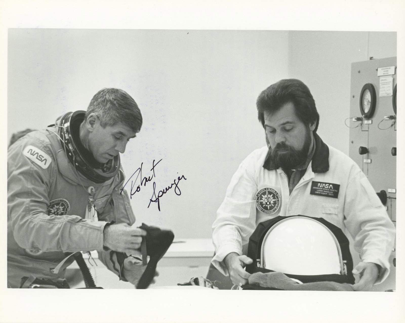 Robert C. Springer - NASA Astronaut - Autographed Official NASA 8 x 10" Photograph: Details: Robert C. Springer autographed official NASA 8 x 10" photograph.Fine condition.Robert Clyde "Bob" Springer (born May 21, 1942) is a retired American astronaut and test pilot who flew as a